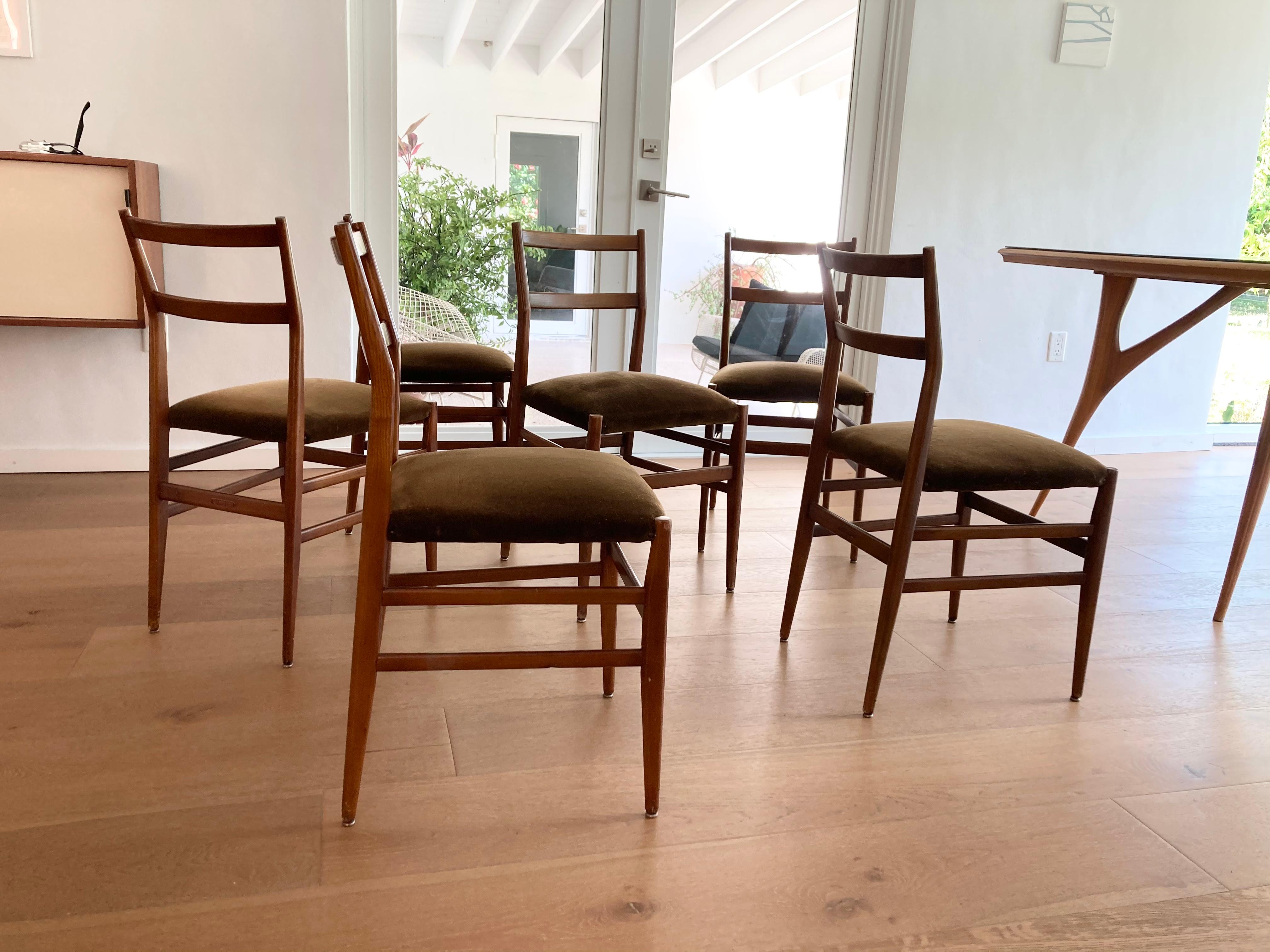 Early set of Gio Ponti dining chairs, the set has age-related wear. Please see all pictures. Table is listed separately.