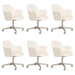Set of Six Eero Saarinen Swivel Arm Dining Chairs on Wheels
