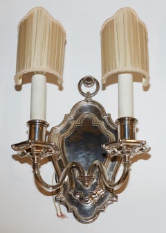 Set of Six E.F. Caldwell Silvered Bronze Shield Back Sconces