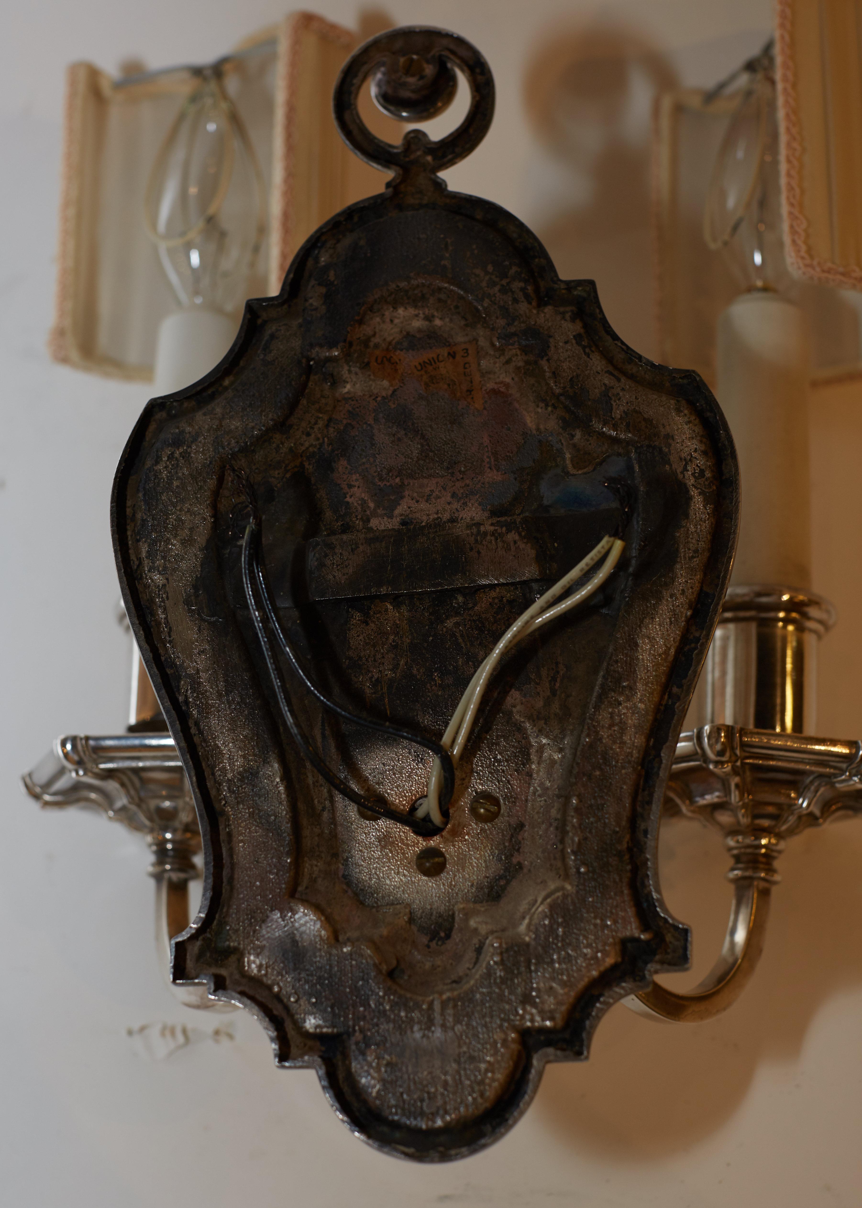 Early 20th Century Set of Six E.F. Caldwell Silvered Bronze Shield Back Sconces