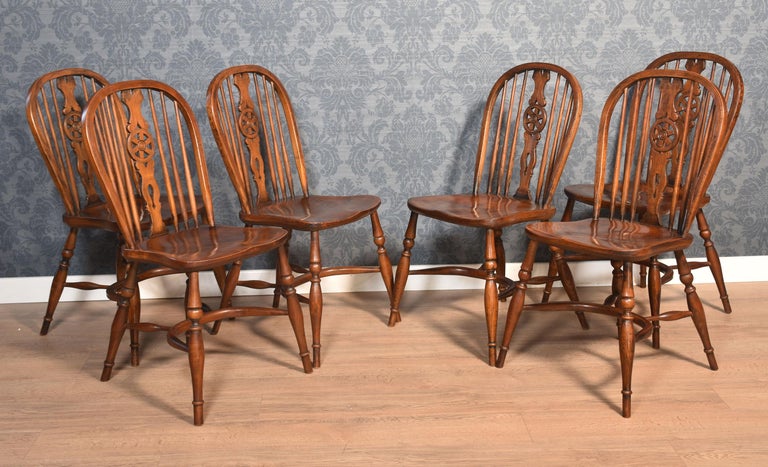 Set of six elm spindle back dining chairs For Sale at 1stDibs