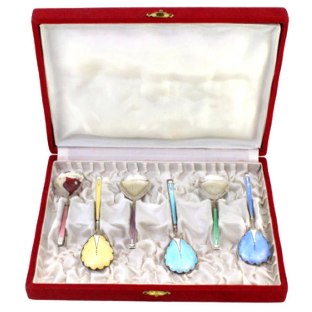 Set of six enameled teaspoons in different colors in original satin case