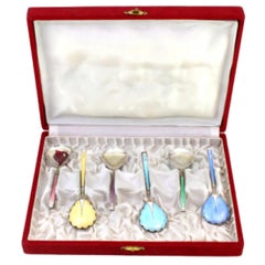 Set of six enameled teaspoons in different colors in original satin case