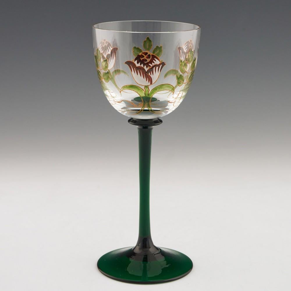 Set of Six Enamelled Theresiental Wine Glasses

Additional Information:
Heading: Set of six enamelled Theresiental wine glasses 
Period: 1920s design, these are modern
Origin: Bavaria, Germany
Colour: Clear glass with green, white, and gilded