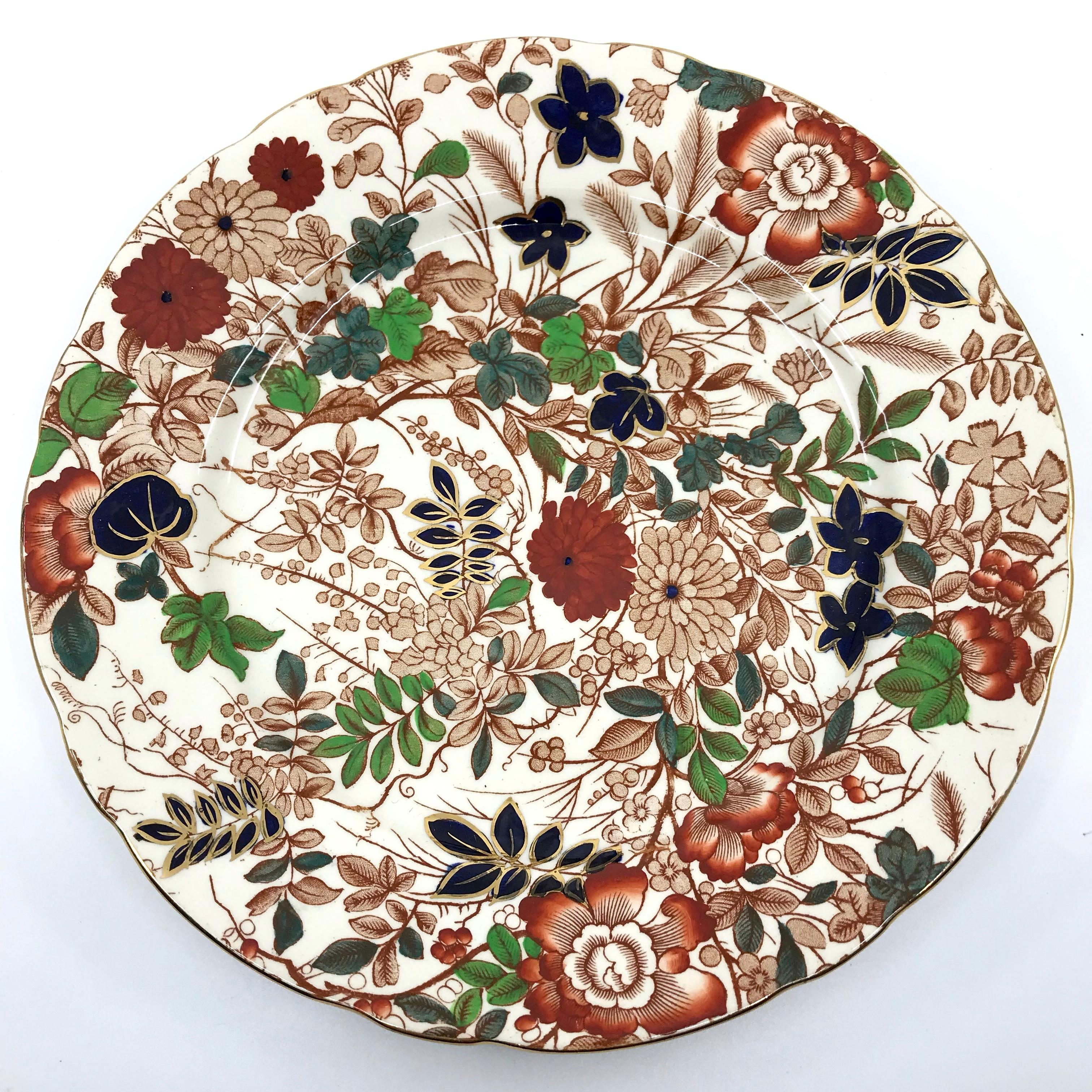 Set of six English Imari-style gilt plates. Perfect gilt-edged and lobed floral plates in Aesthetic blues, brown, green, orange and red with markings for Royal Cauldon. England, circa 1920’s
Dimensions: 9.5