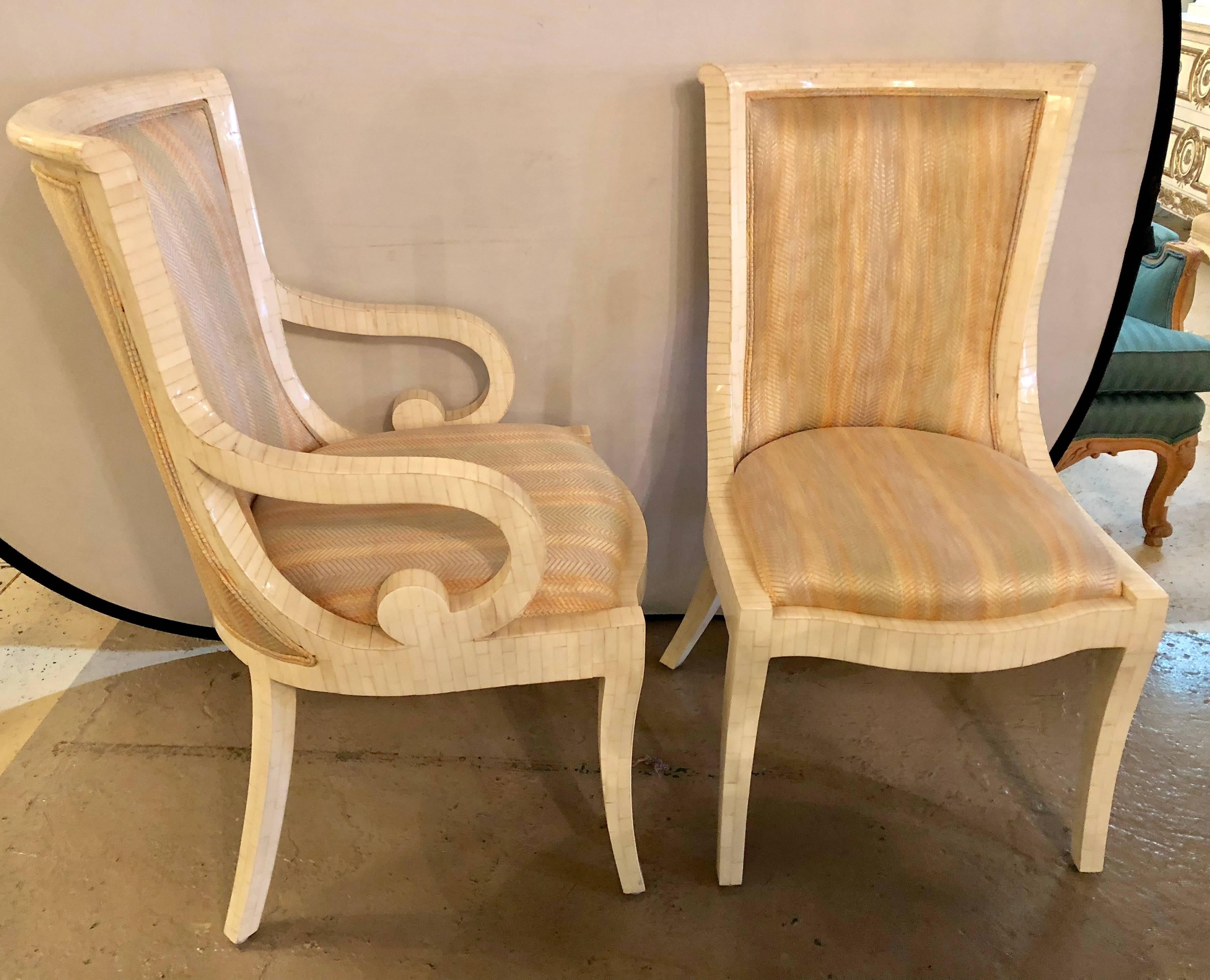 Set of six Enrique Garcel bone tassellated dining chairs manner of Karl Springer. Set of six Mid-Century Modern tessellated bone and upholstered dining chairs attributed to Karl Springer. Features two armchairs and four side chairs. Upholstery in
