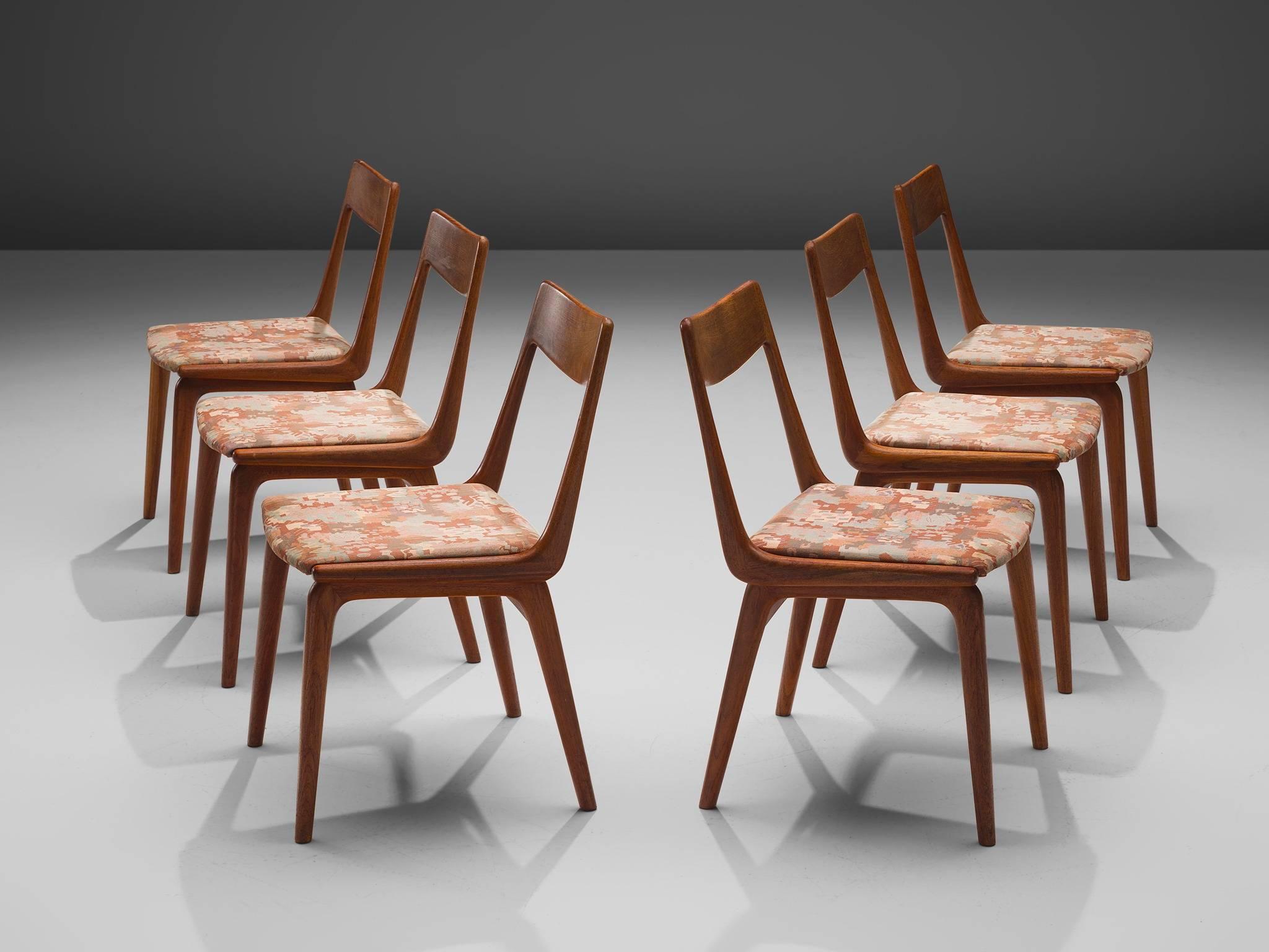 Erik Christiansen, set of six 'Boomerang' chairs, teak, fabric, Denmark, 1960s.

Clearly shaped chair with elegant legs. On the sides of the seating there is a boomerang shaped wood construction that ends in the backrest. The chairs seems to exist