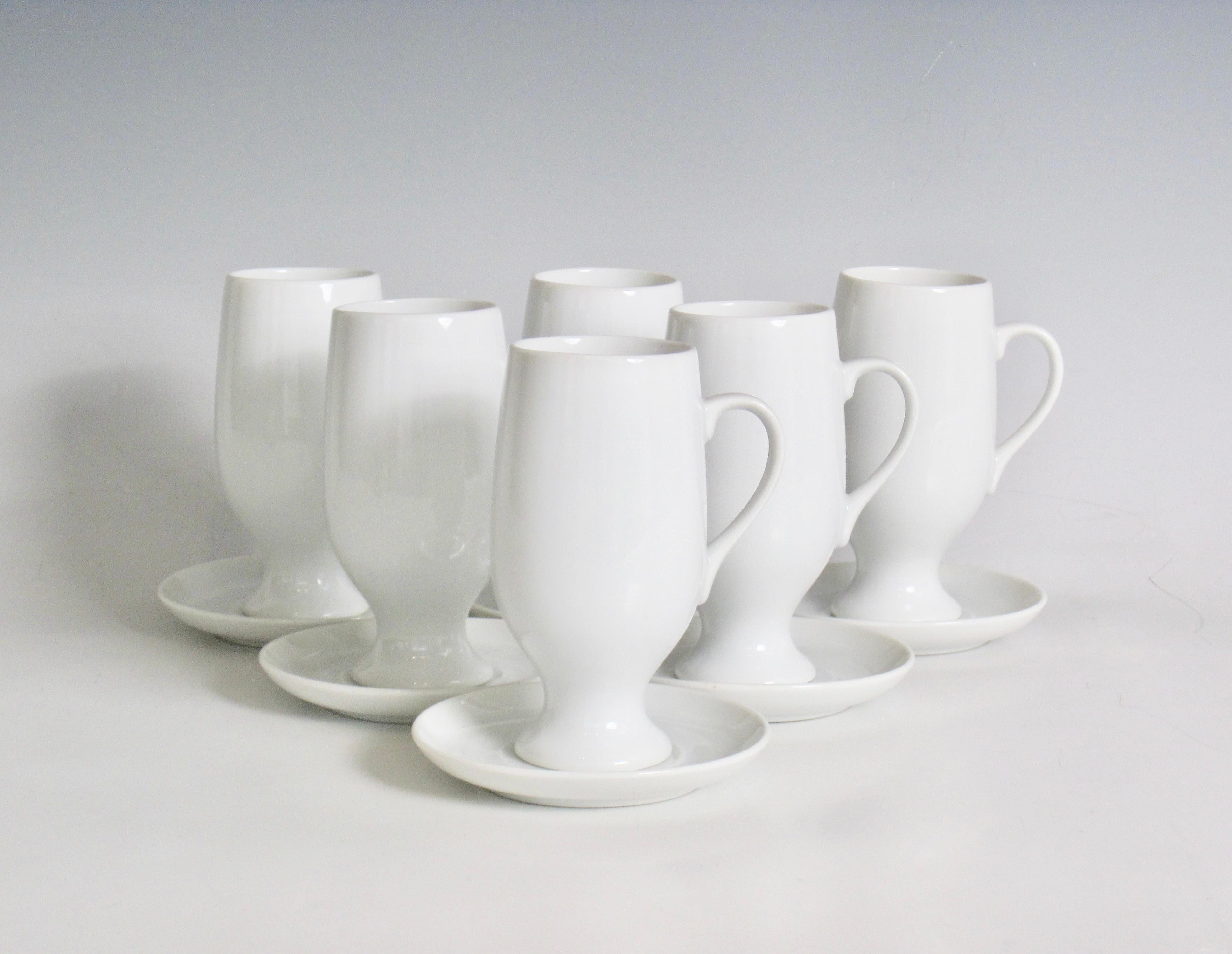 Set of six demitasse espresso cups and saucers in white porcelain made in Japan circa 1960s. Designed by Lagardo Tackett and produced by Schmid Kreglinger for the European and American markets. Good condition, no chips or cracks.