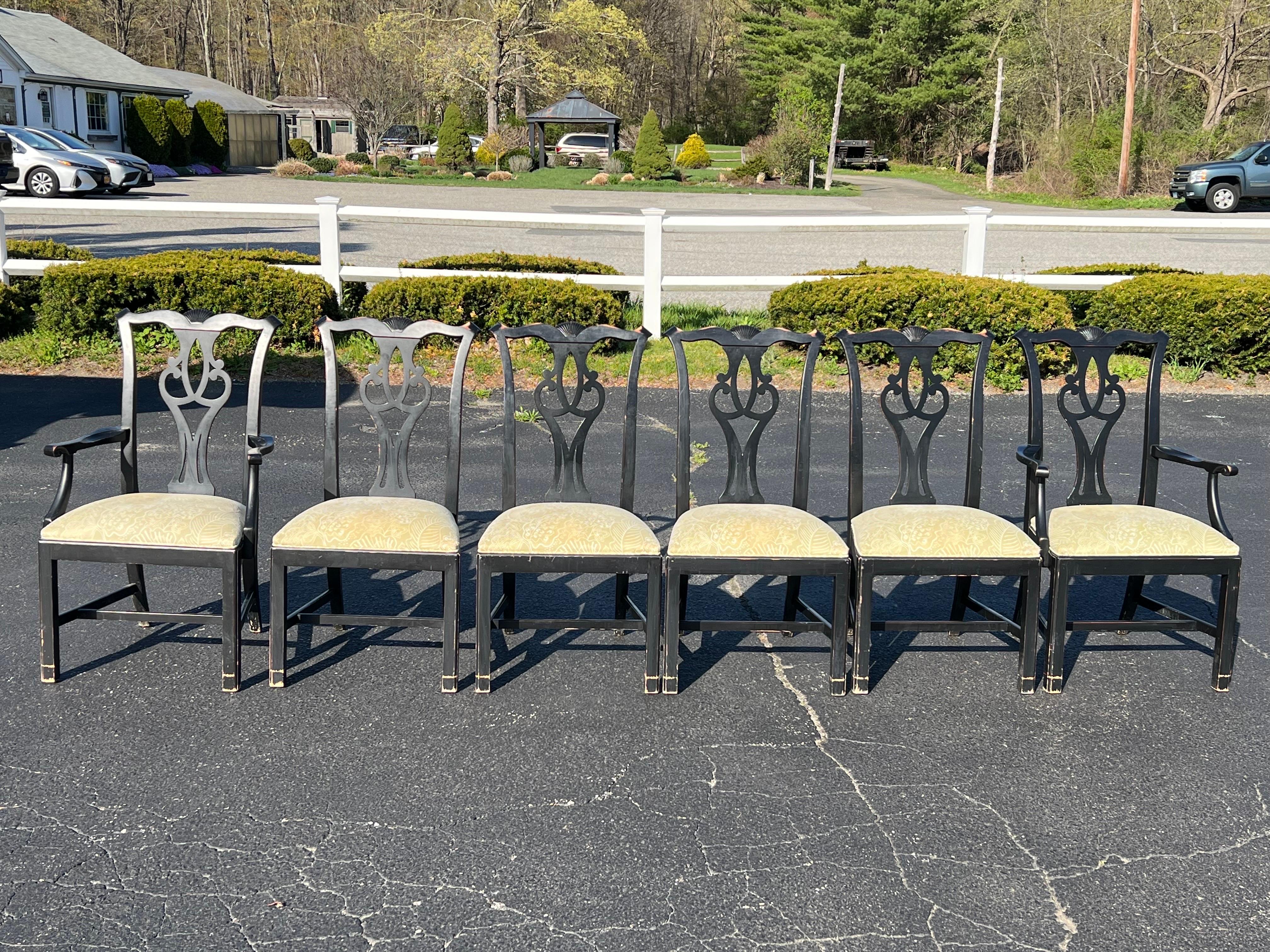 Set of Six Chippendale Dining Chairs in Black. Two arm chairs and four side chairs. These upholstered seats are covered in a pale sage green and white. Use as is or simply recover the seat cushions. Perfect for that country farmhouse. Distressed