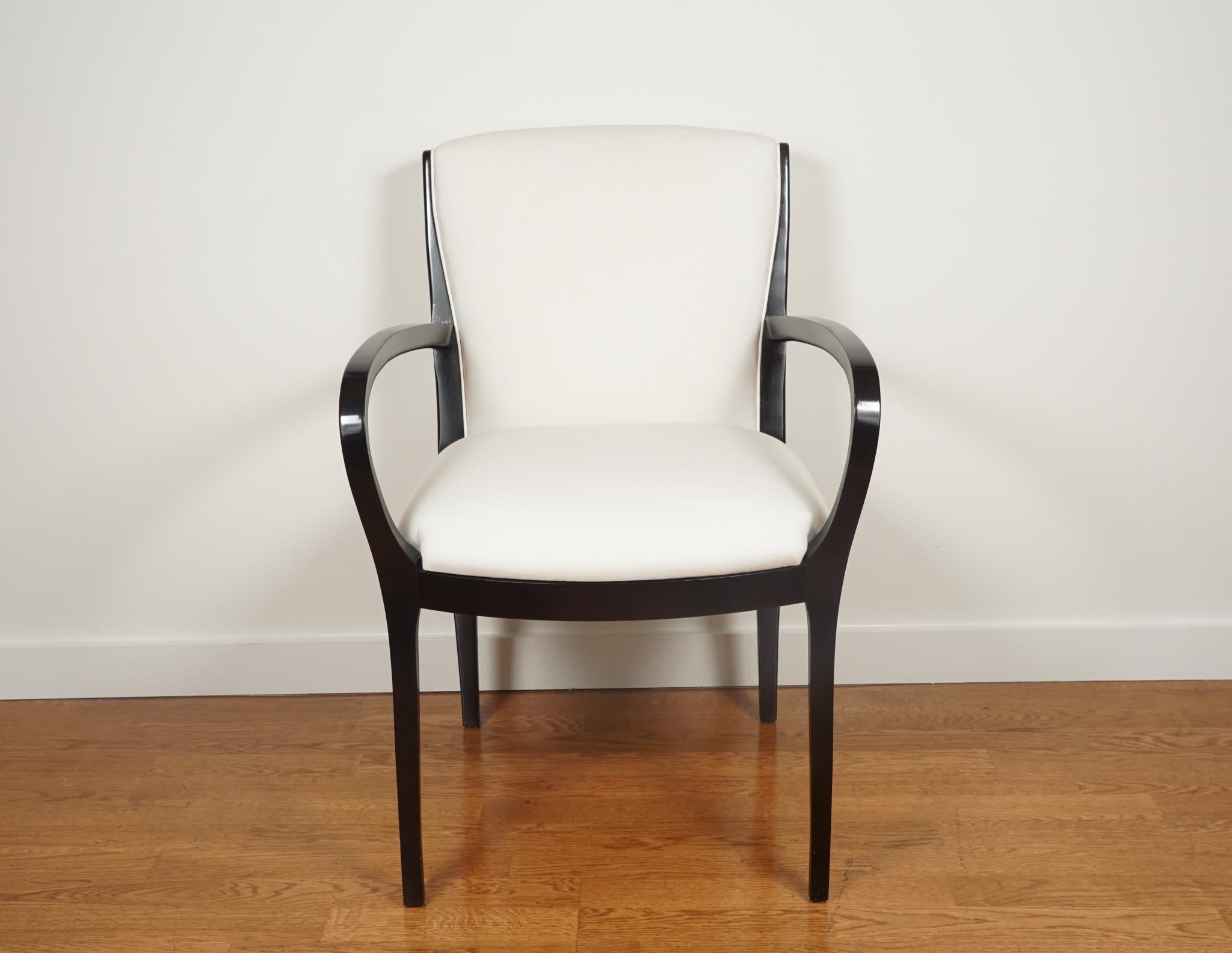 Beautiful, sleek, maple dining chairs. Completely refurbished with a modern ebonized finish.
Reupholstered in a soft ivory muslin.