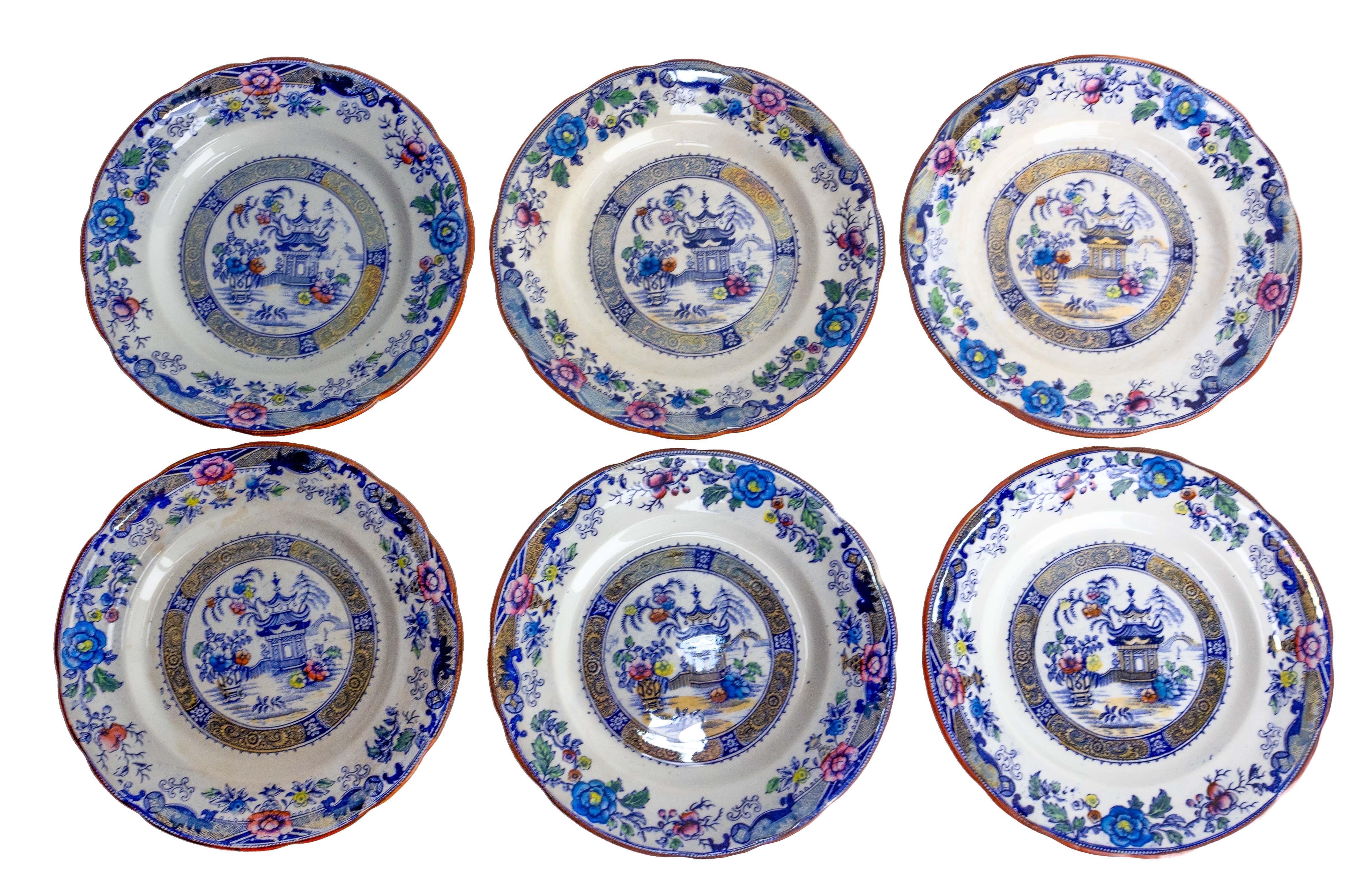 French set of six faience plates, made in the manufacture of 