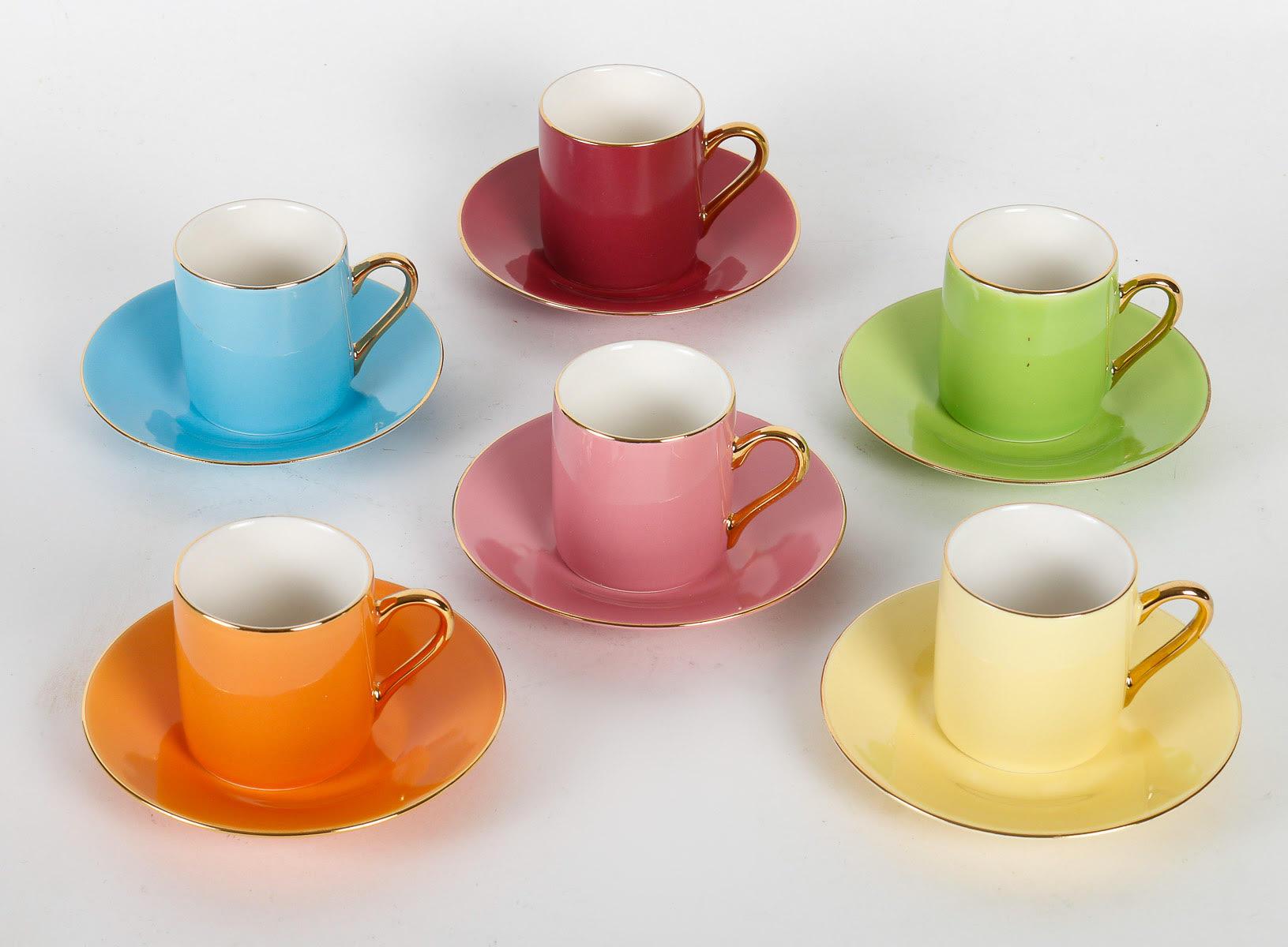 Set of Six Fine Porcelain Cups and saucers.

Set of six fine porcelain cups and saucers in their box, in spring colours.  
Box: h: 7cm, w: 27cm, d: 25,5cm