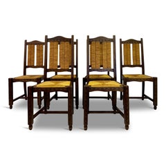 Set of Six French 1950s Oak and Rush Dining Chairs