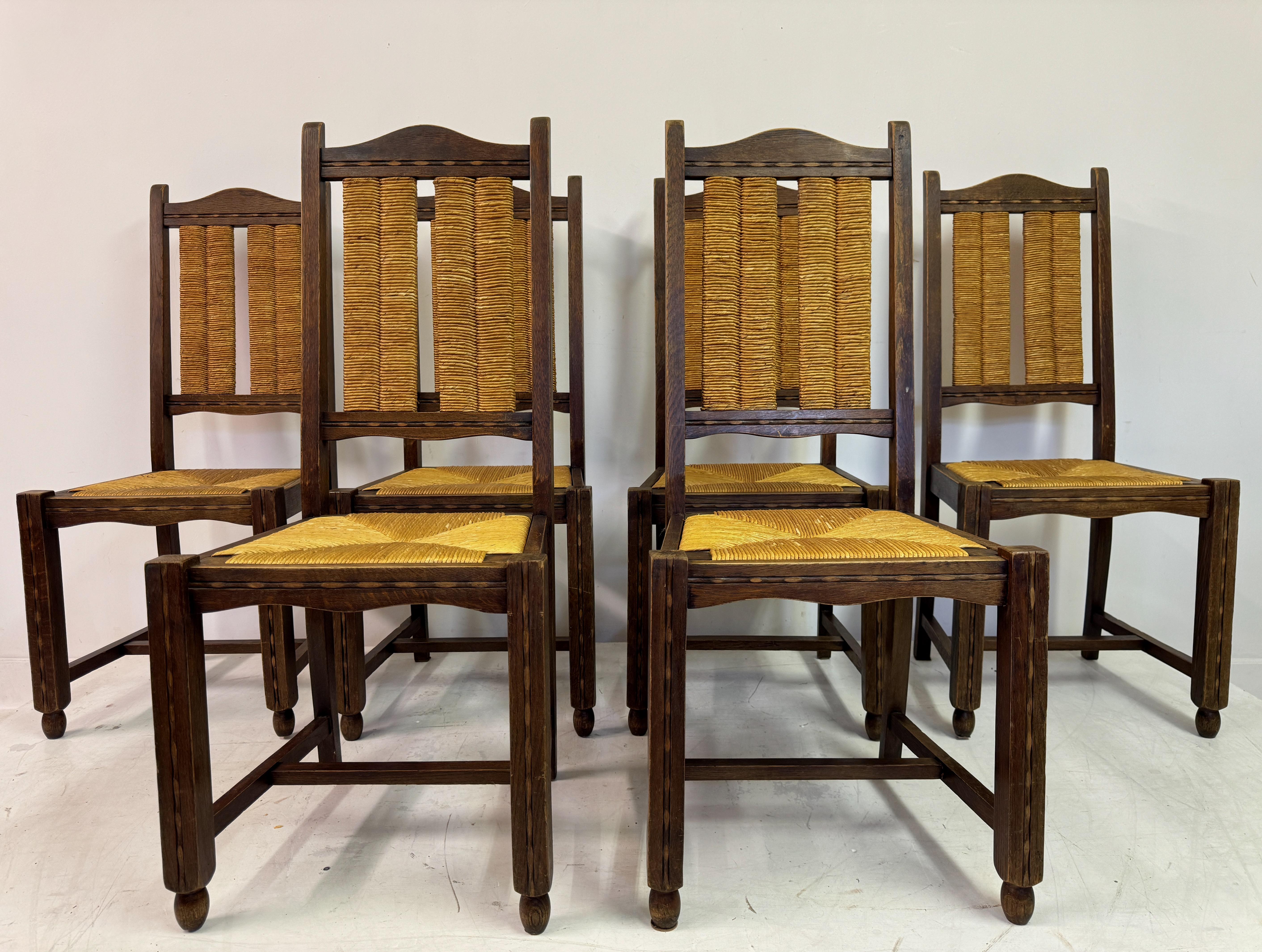 20th Century Set of Six French 1950s Oak and Rush Dining Chairs For Sale