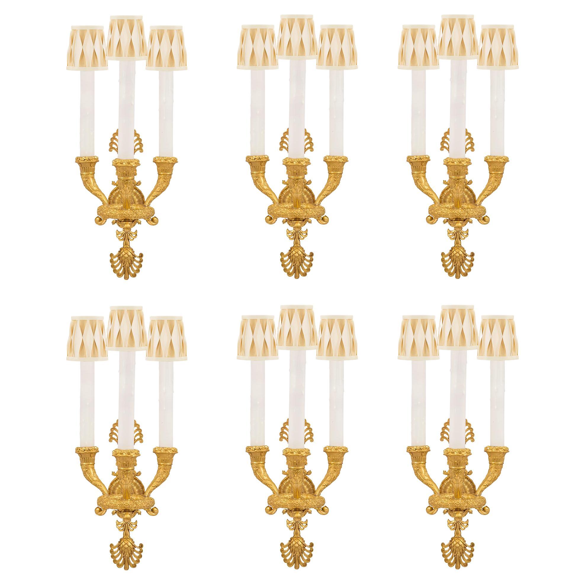 Set of Six French 19th Century Neoclassical Style Three-Arm Ormolu Sconces For Sale