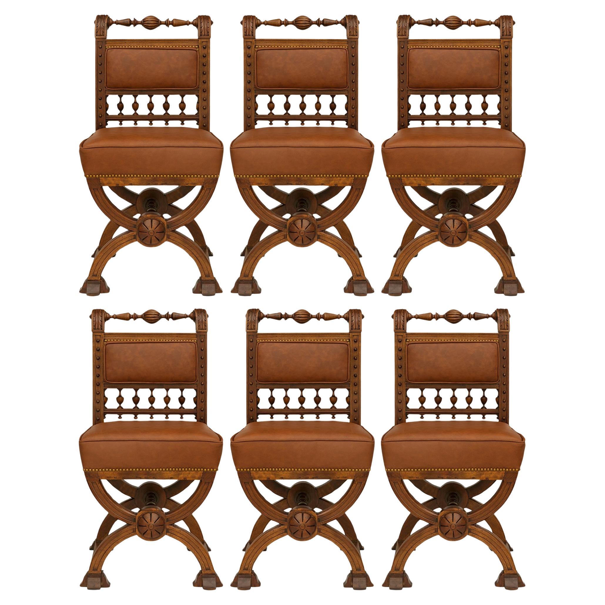 set of six French 19th century Renaissance st. Walnut and Leather dining chairs en venta