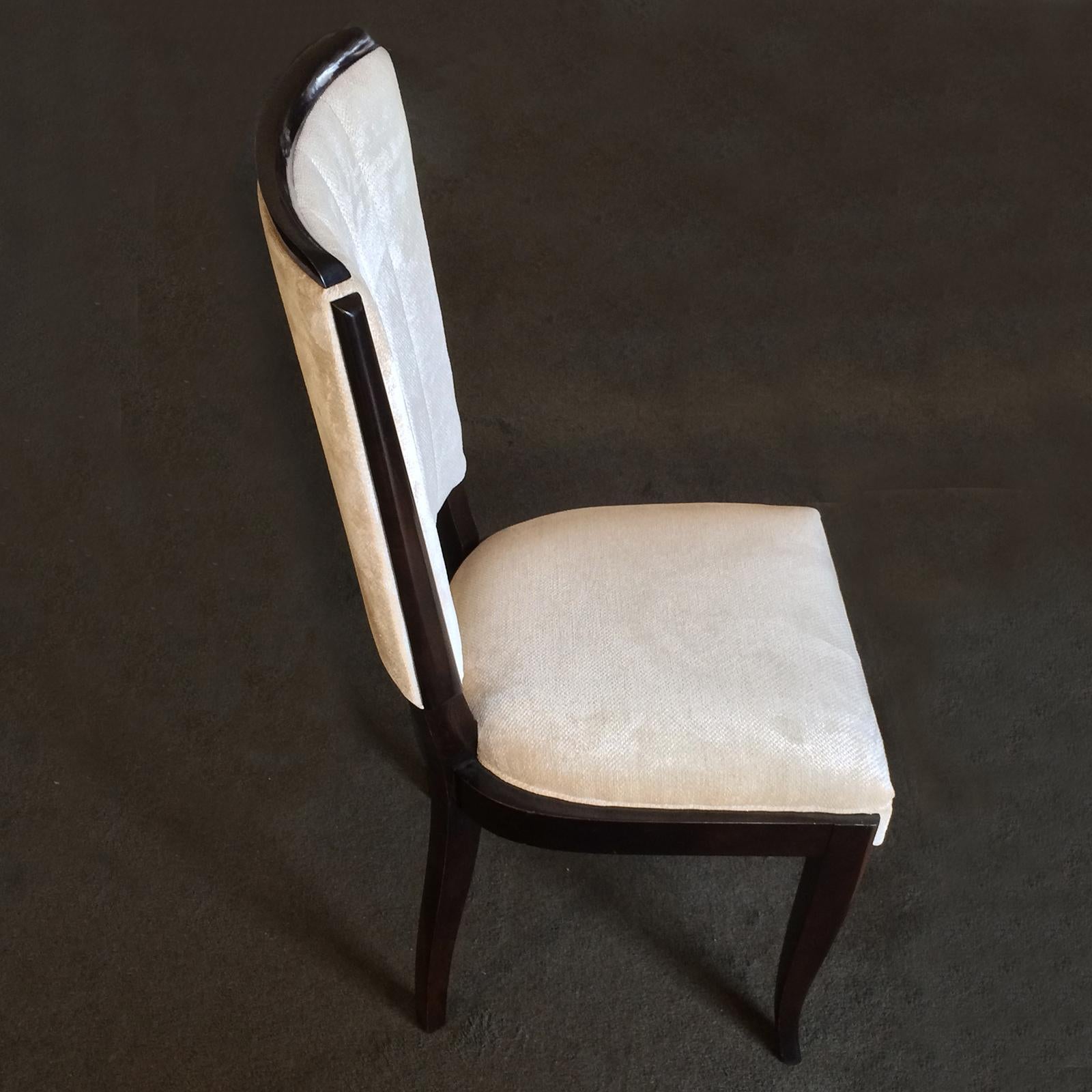 Art Deco dining chairs, suite of six, totally re-upholstered with cream commercial quality velvet with vertical ribs to back support. A very elegant chair, with gentle cabriole like curved front legs and light reversed curves to rear legs. Amboyna