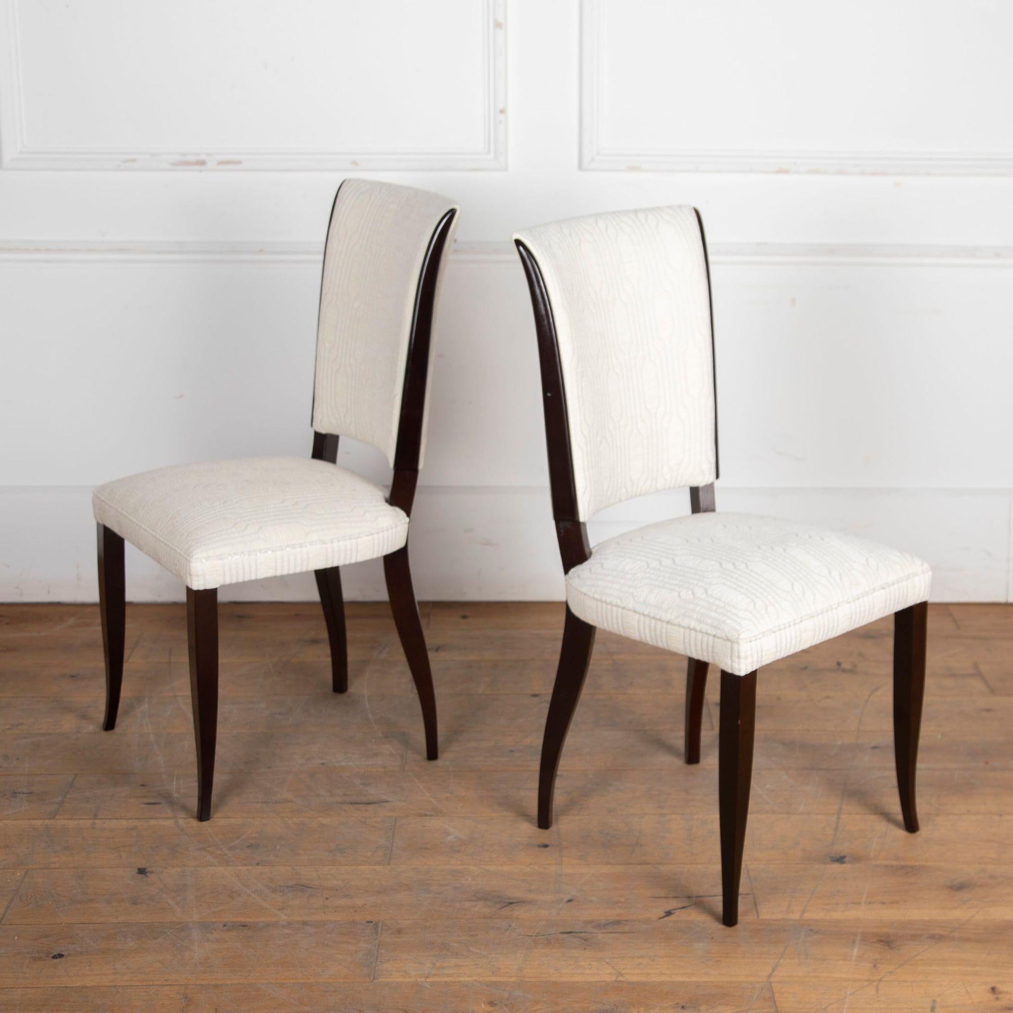 A wonderful set of six French art deco dining chairs. 
Each seat is covered with off-white velvet upholstery, that is attractively worn and will stand the test of time. 
In good structural condition for their age. 
Would look fantastic in both