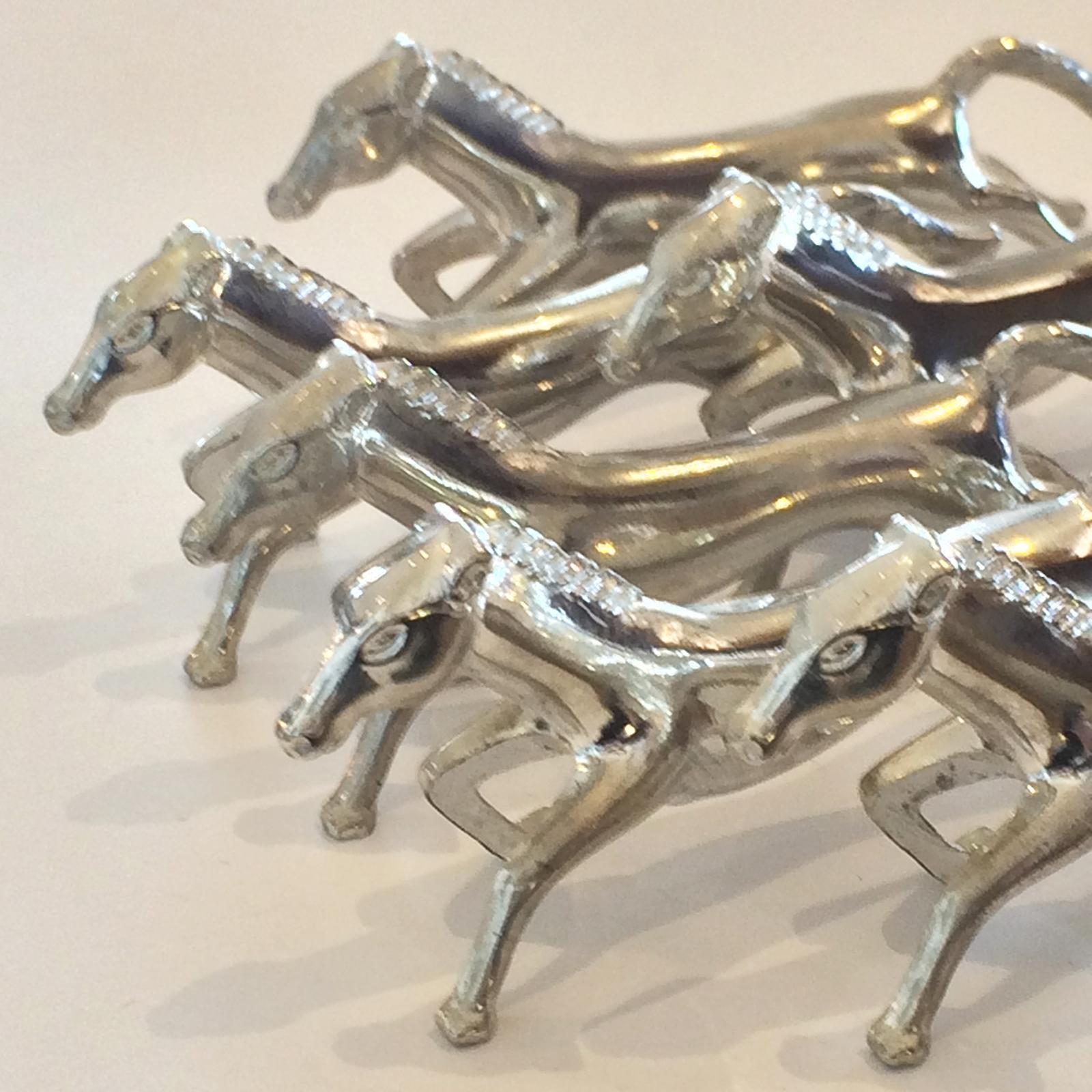 Art Deco French knife rests, 6 galloping horses in quality silver plate. All in “as new” condition, no damage, original silver finish. These are as good as you will get, lovely set. Dimensions are approximate: 8.5cm long x 3.5cm high x 1.5cm wide.