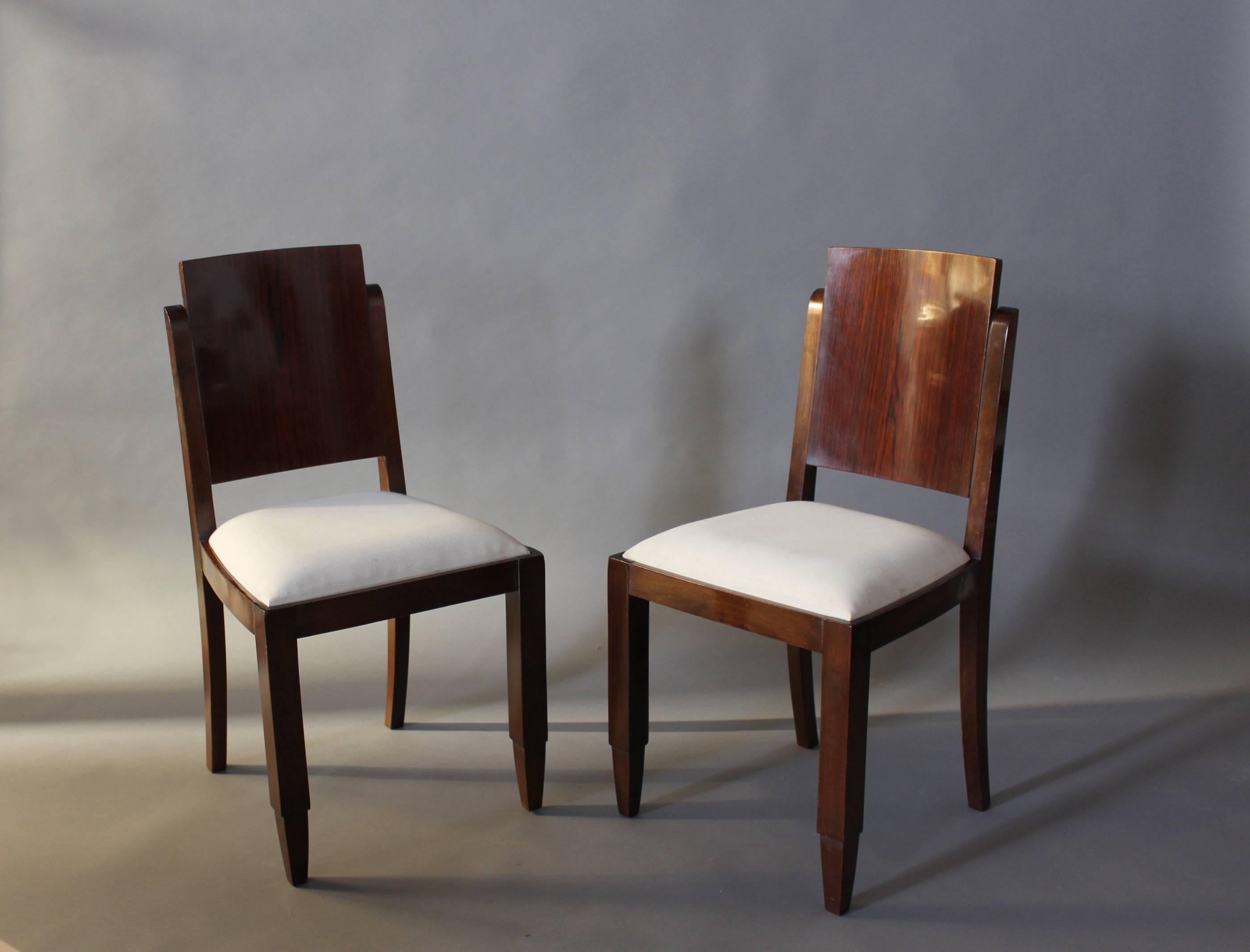 A set of six French Art Deco stained solid beech frames dining chairs with rosewood veneered backs.