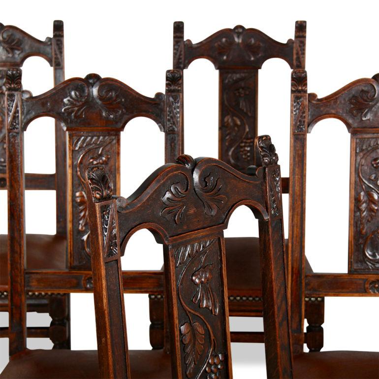 A set of six French dining chairs in oak, the turned legs united by an ‘H’ stretcher, the backs with carved centre-back splat, circa 1920.





 