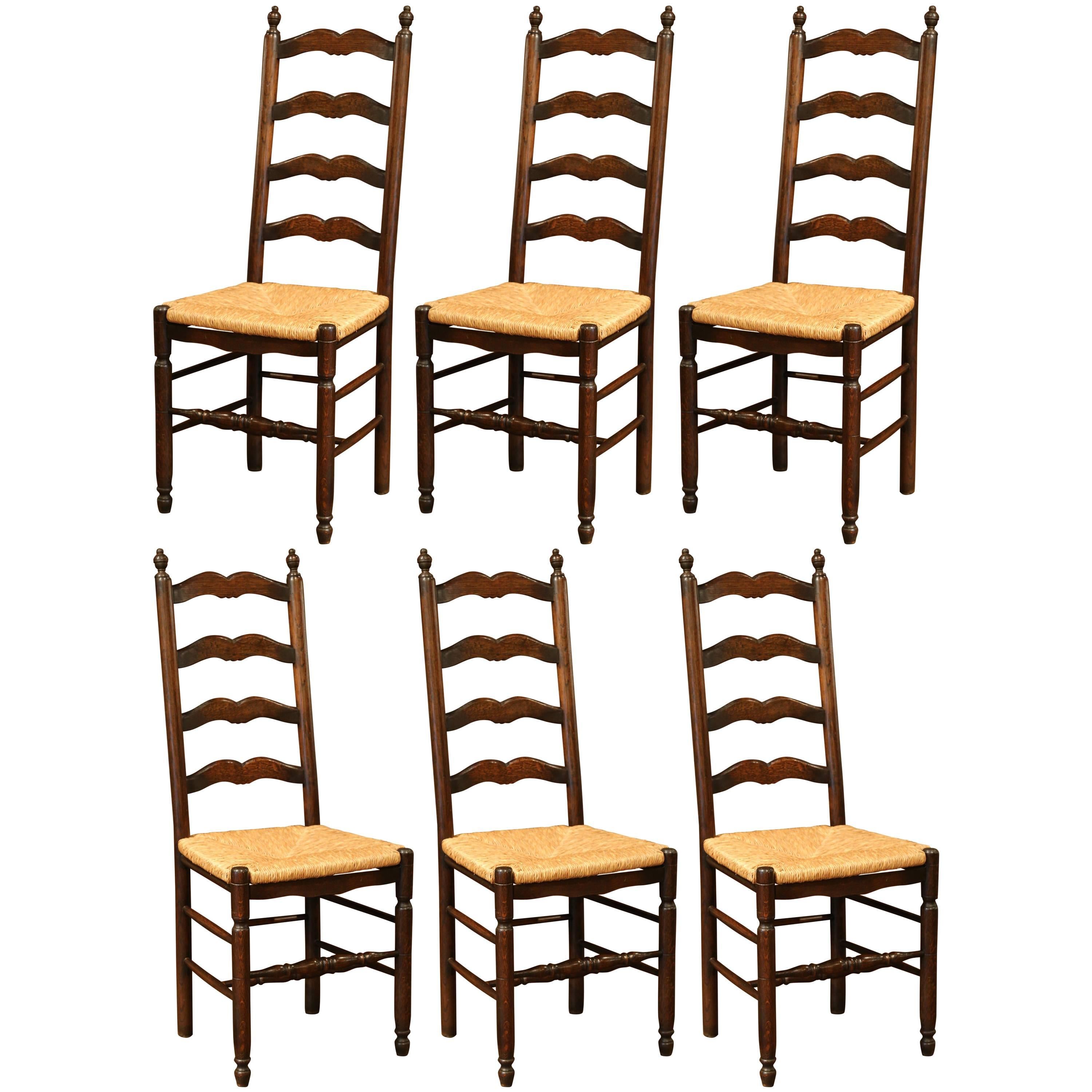 Set of Six French Carved Oak Ladder Back Chairs with Rush Woven Seat