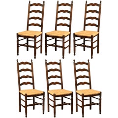 Antique Set of Six French Carved Oak Ladder Back Chairs with Rush Woven Seat