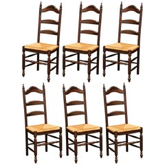 Antique Set of Six French Carved Oak Ladder Back Chairs with Rush Woven Seat