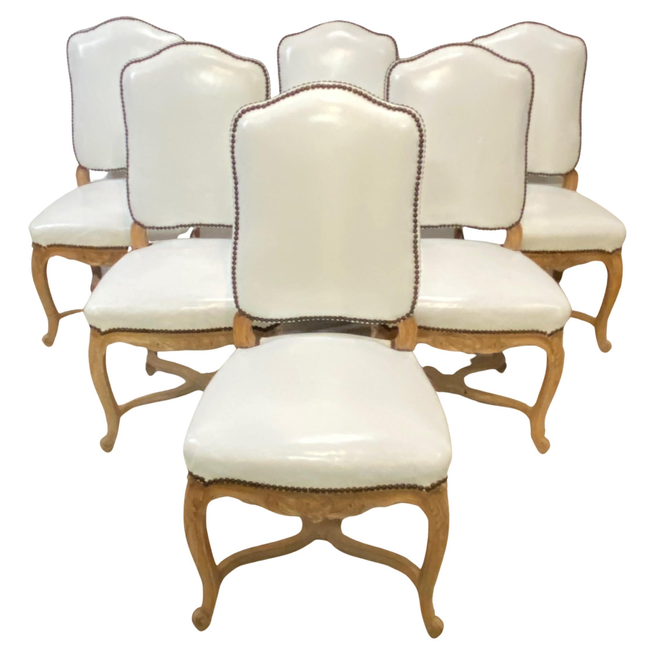 Set of Six French Carved Wood and White Leather Dining Chairs For Sale