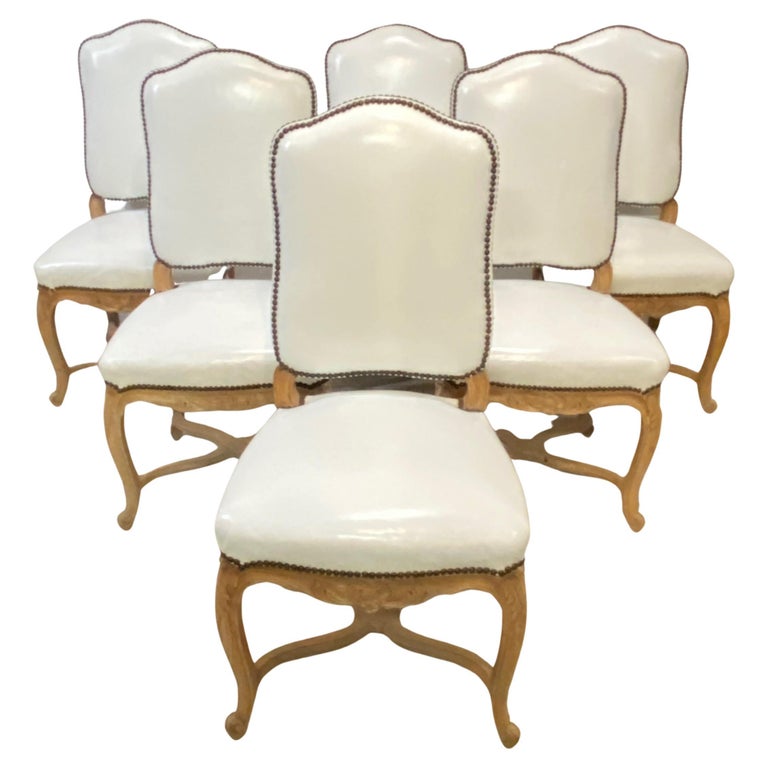 Set of Six French Carved Wood and White Leather Dining Chairs For Sale