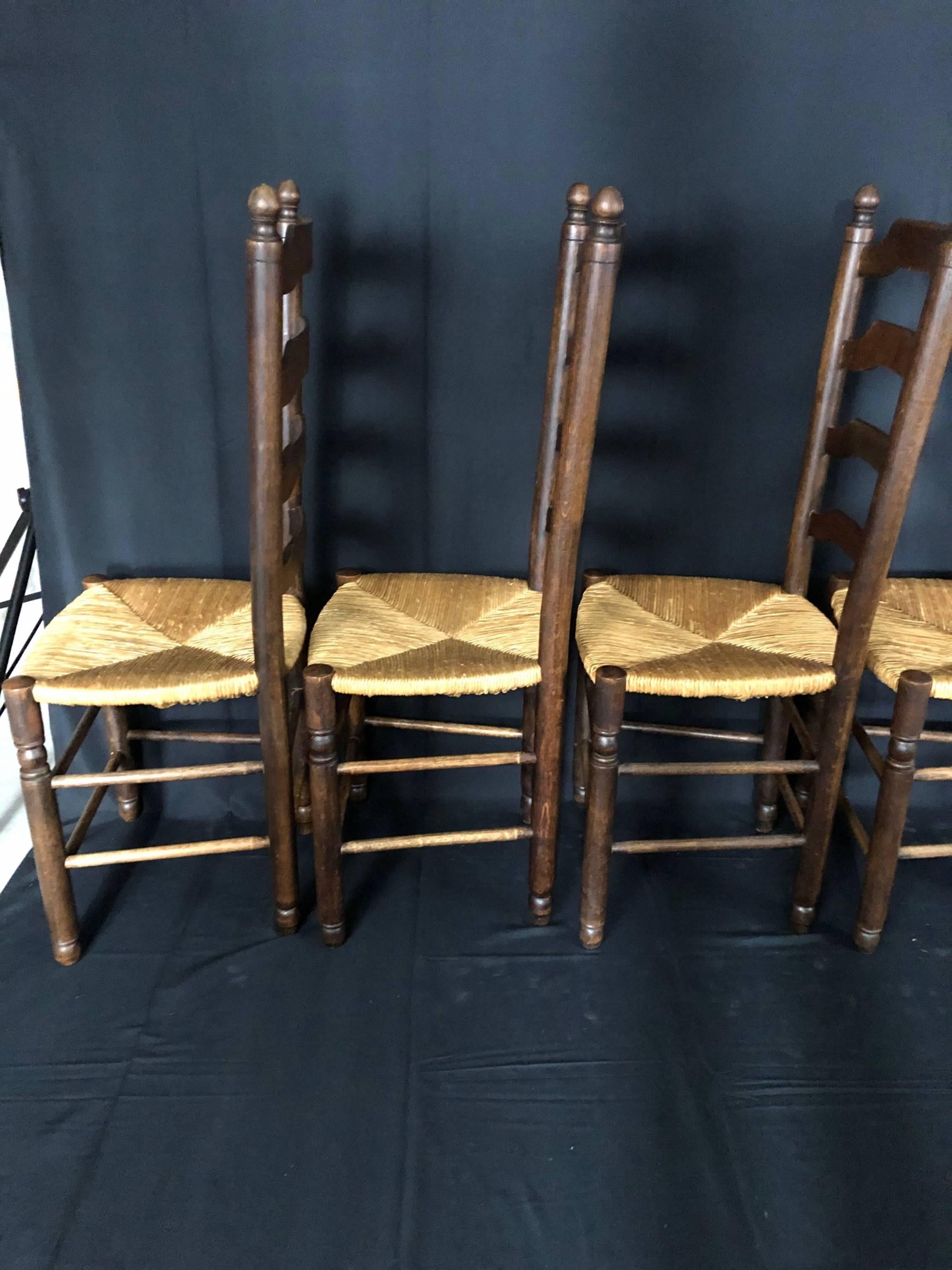 Classic set of 6 French Country ladderback dining chairs with rush seats from Normandy in great condition. #5123.