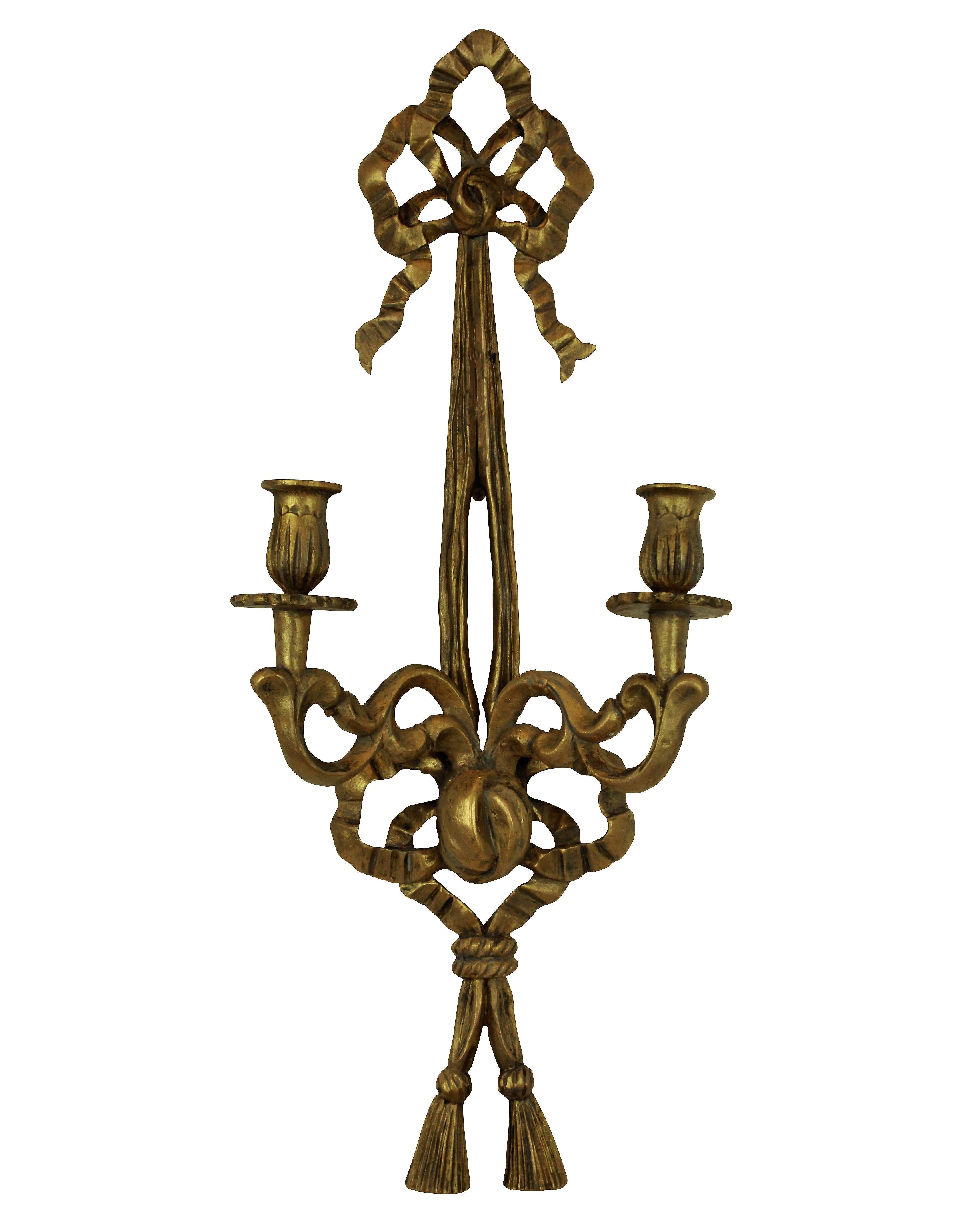 A set of six French carved and gilded wall sconces.