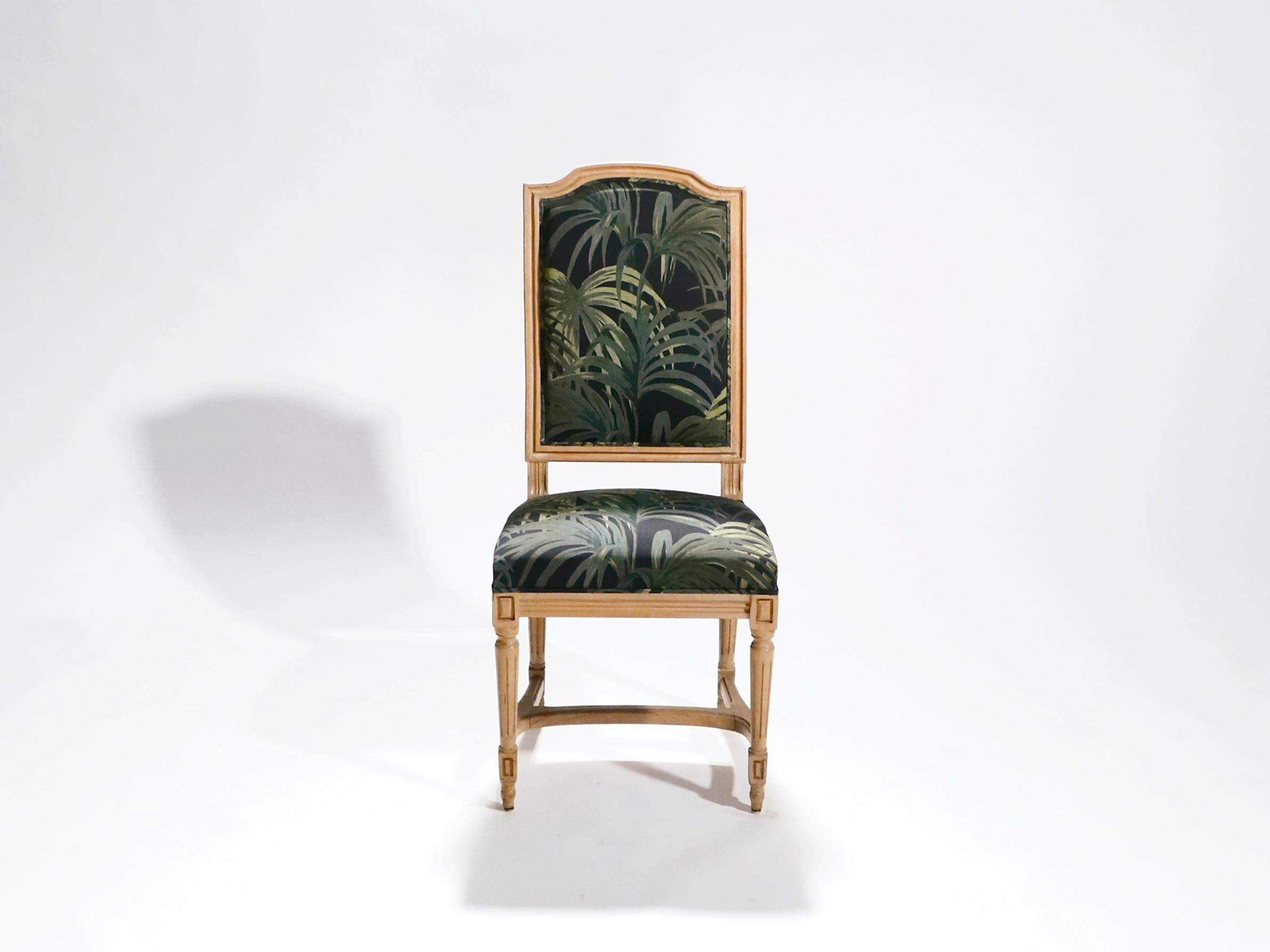 New colorful upholstery is a great contrast to the beautiful old oak in these chairs. The lovely patina evident on the oak feet and structure is enough to convey the half-century of history in this set of 6, so the upholstery, in a fresh palm