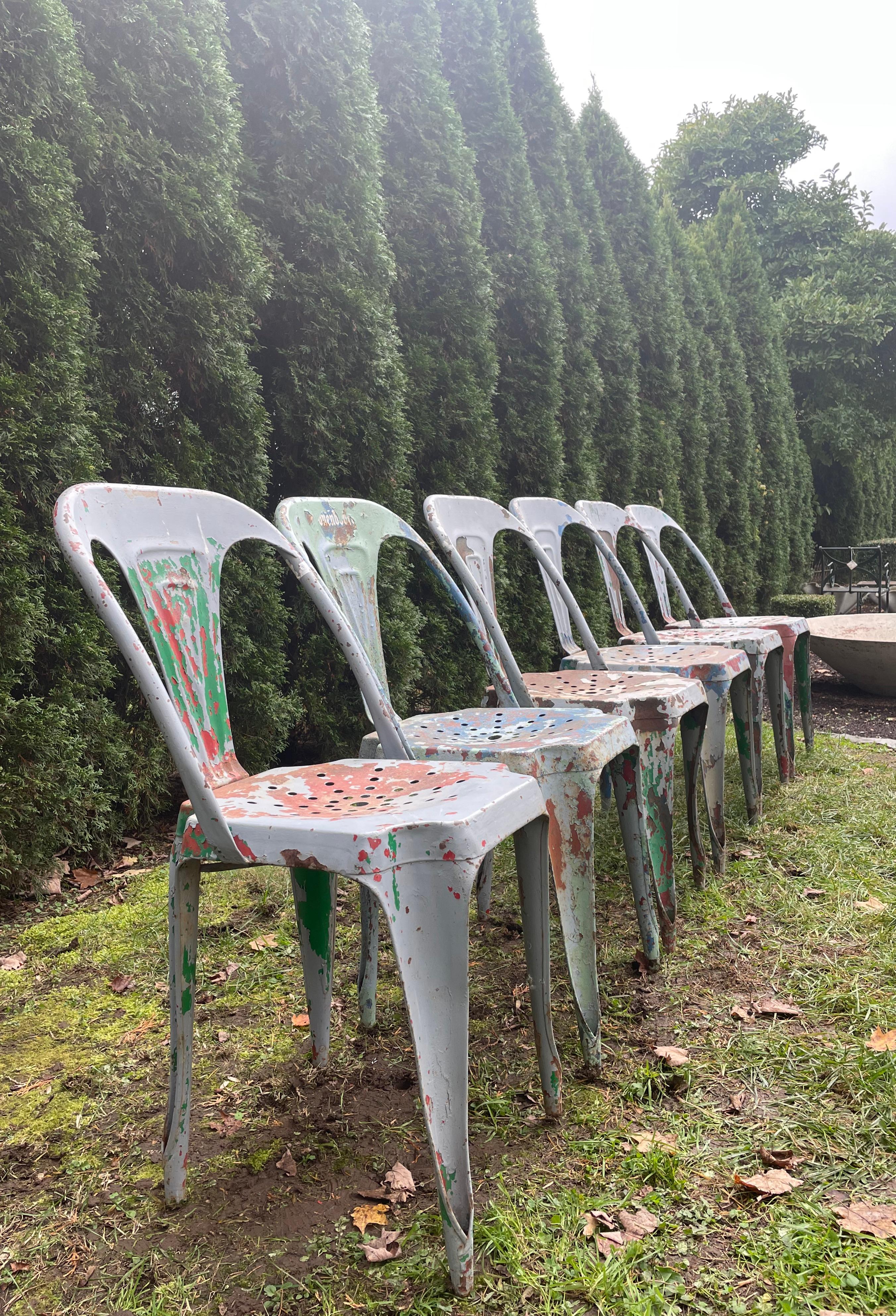 This rare set of six French 1940s Multipl’s metal dining chairs is in excellent original condition and features an amazing mottled painted surface of grey, green, red, and blue. Designed by Joseph Mathieu and made by Pierre Benite in Lyon, these
