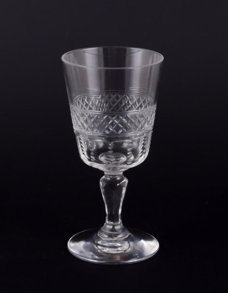 A set of six mouth-blown French port wine glasses in crystal glass. Faceted. Handmade. 
Circa 1900. 
Perfect condition. 
Dimensions: H 10.0 cm x D 4.5 cm.