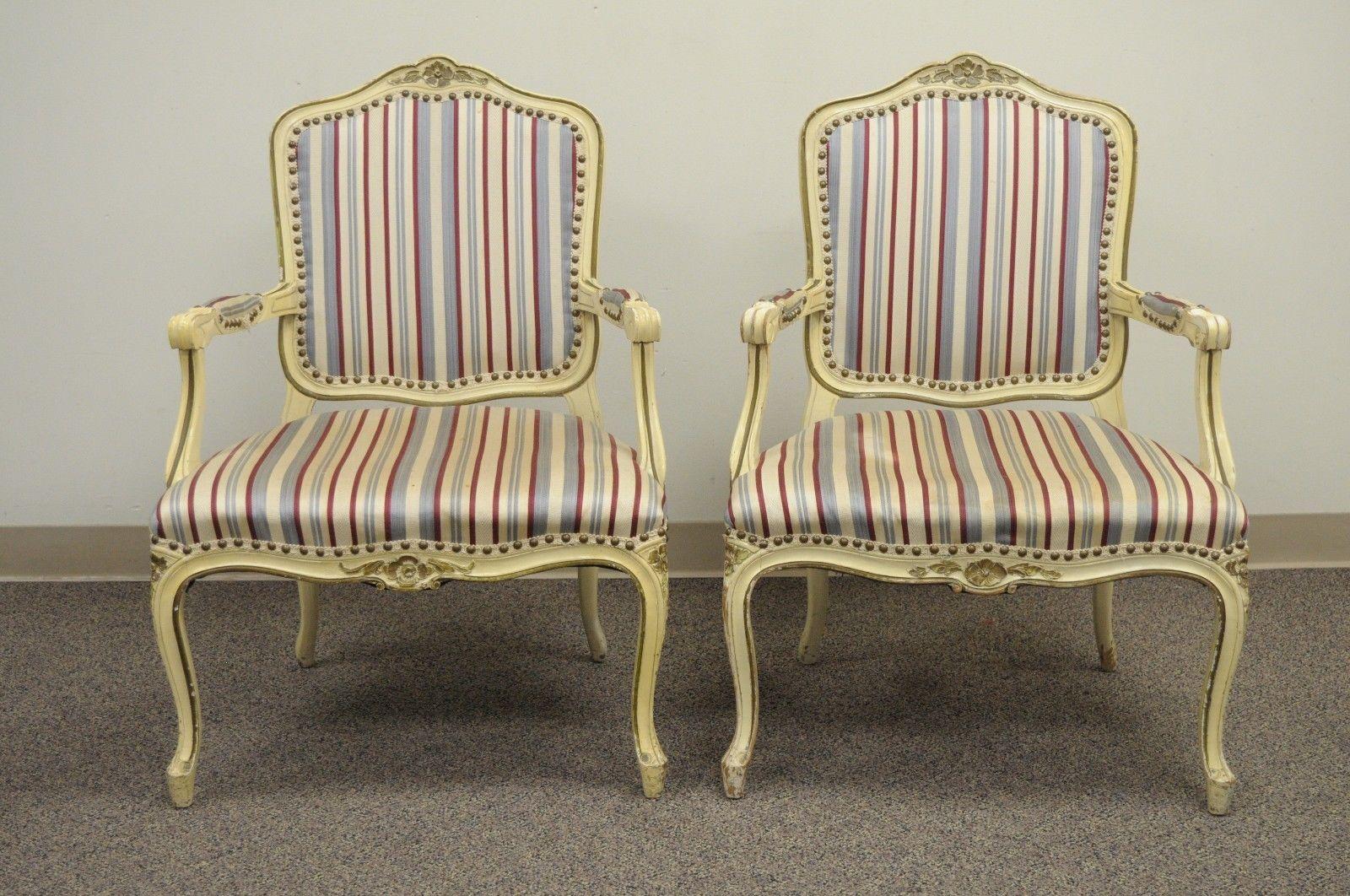 Set of six vintage French Provincial / Louis XV style cream painted dining room chairs. Item features four side chairs, two armchairs, solid wood frames, cabriole legs, upholstered back and seats, and a cream painted finish, American, circa mid-20th