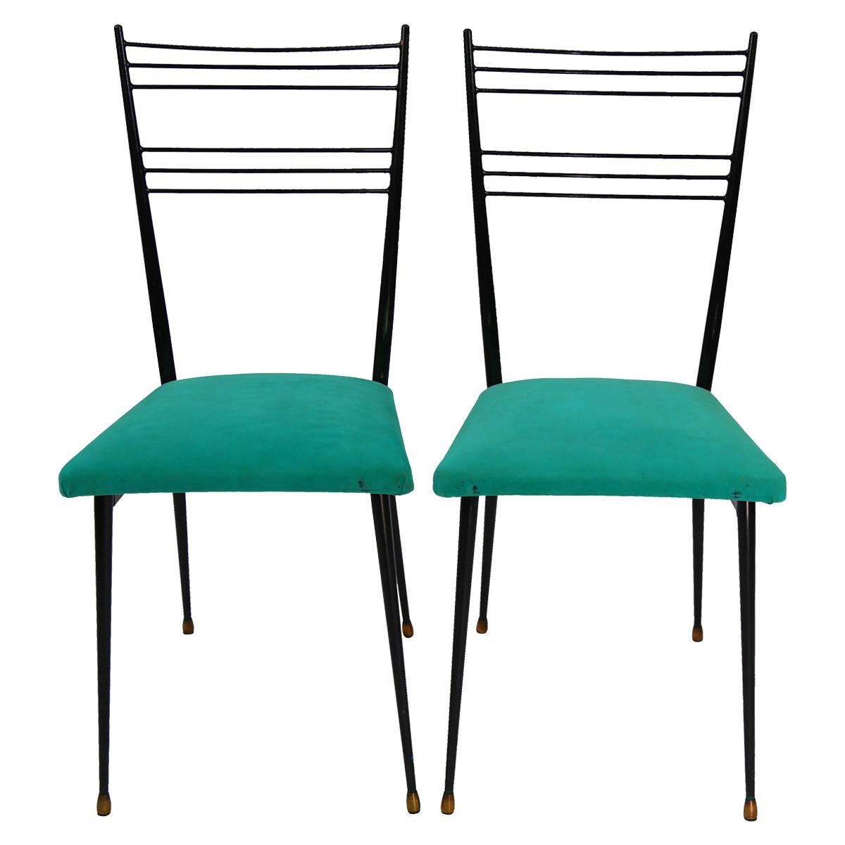 Set of six elegant Italian wrought iron stylized ladder back chairs with blue/green ultra suede seats. The chairs are in the style of Gio Ponti, circa 1960.
 