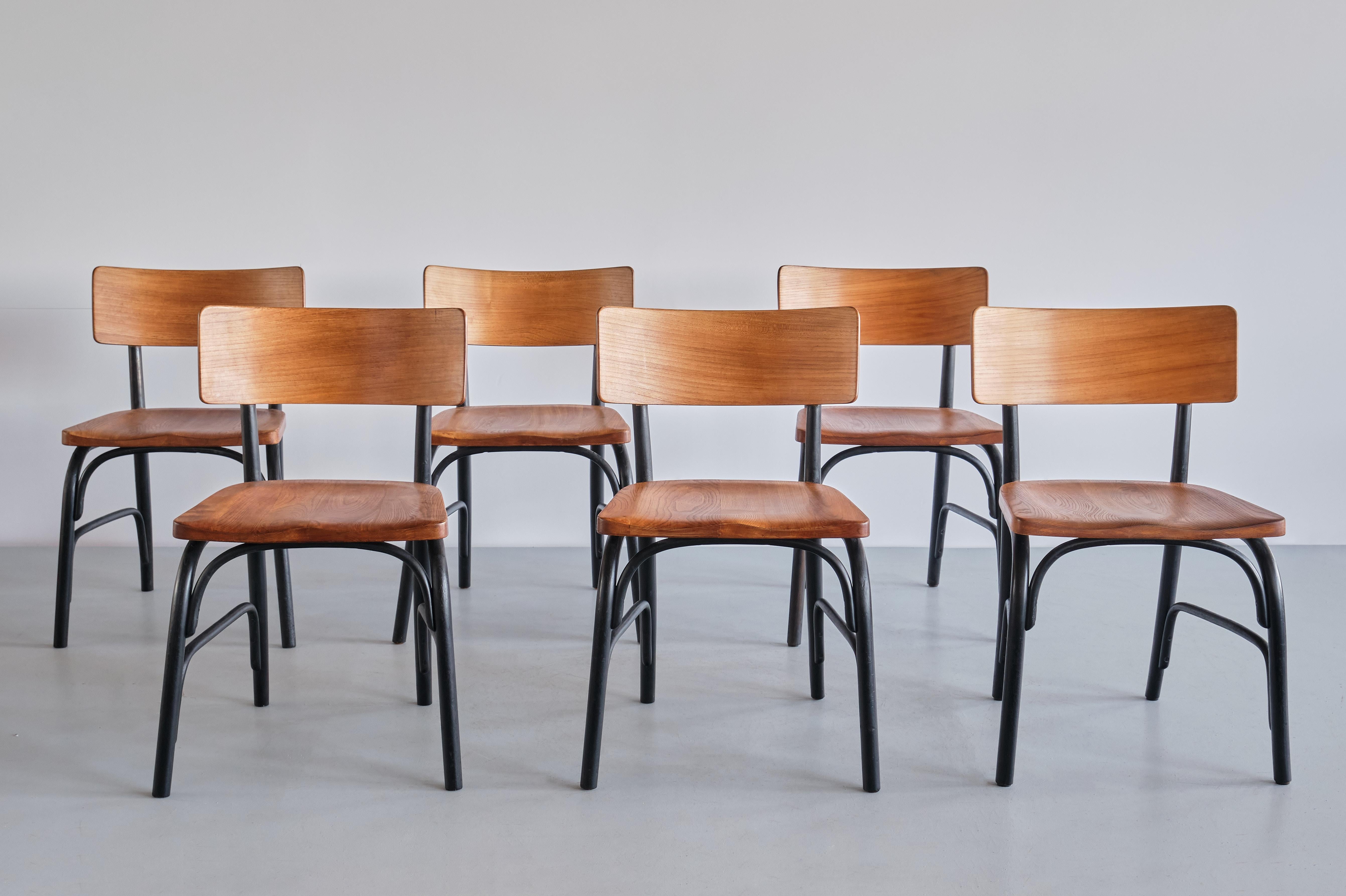 This rare set of six dining chairs was designed by the Danish designer and architect Frits Schlegel in the 1930s. This model 'Husum' chair was designed by Schlegel for the teacher's room of a school in Husum, located in the outskirts of Copenhagen.