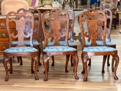 Set of Six George I Burlwood Veneered and Carved Dining Chairs