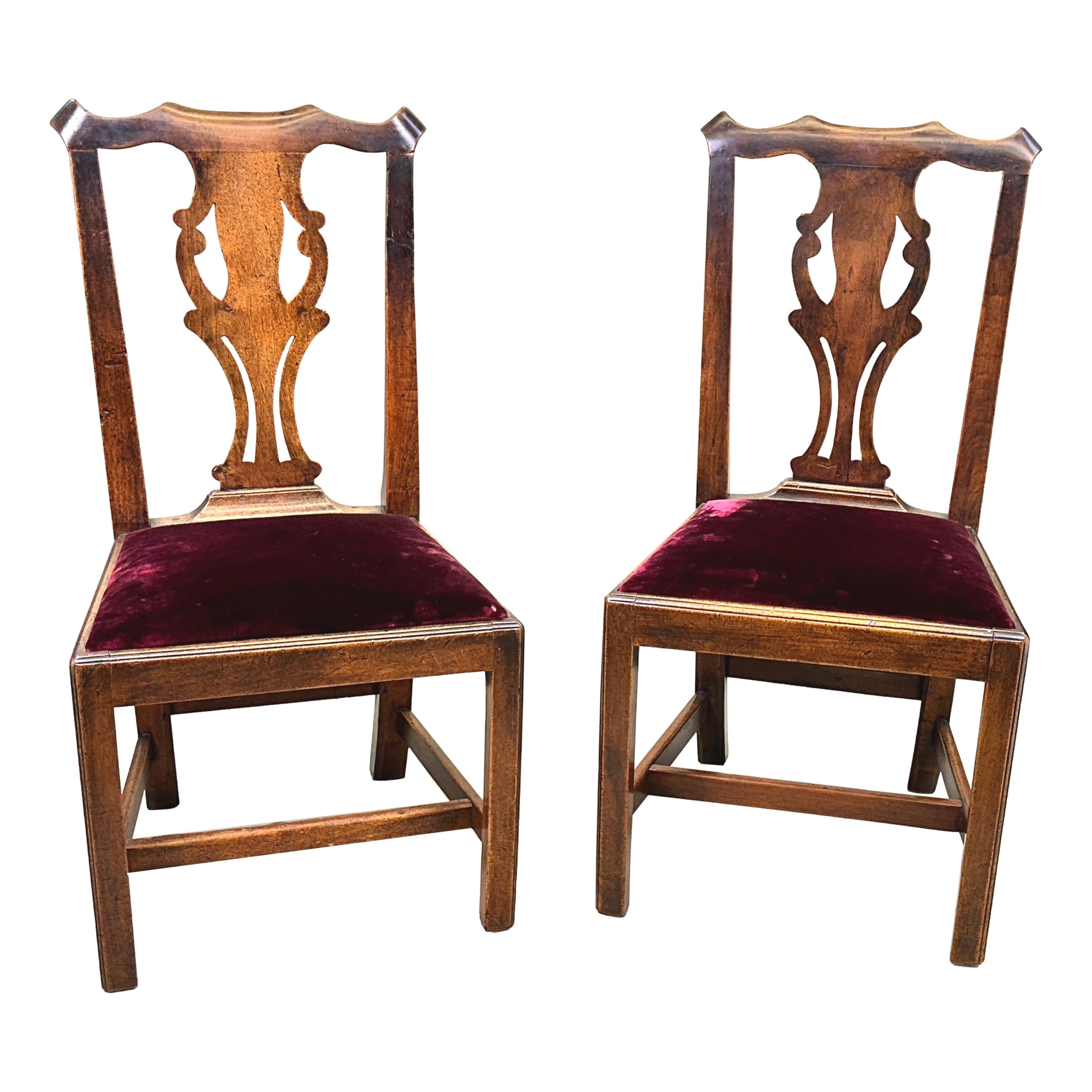 An Extremely Charming Set Of Six Mid 18th Century, Georgian, Chippendale Period, Solid Walnut Country House Type Dining Chairs, Having Very Attractive Pierced Splat Backs With Scrolling Top Rails Over Upholstered Drop In Seats Raised On Square
