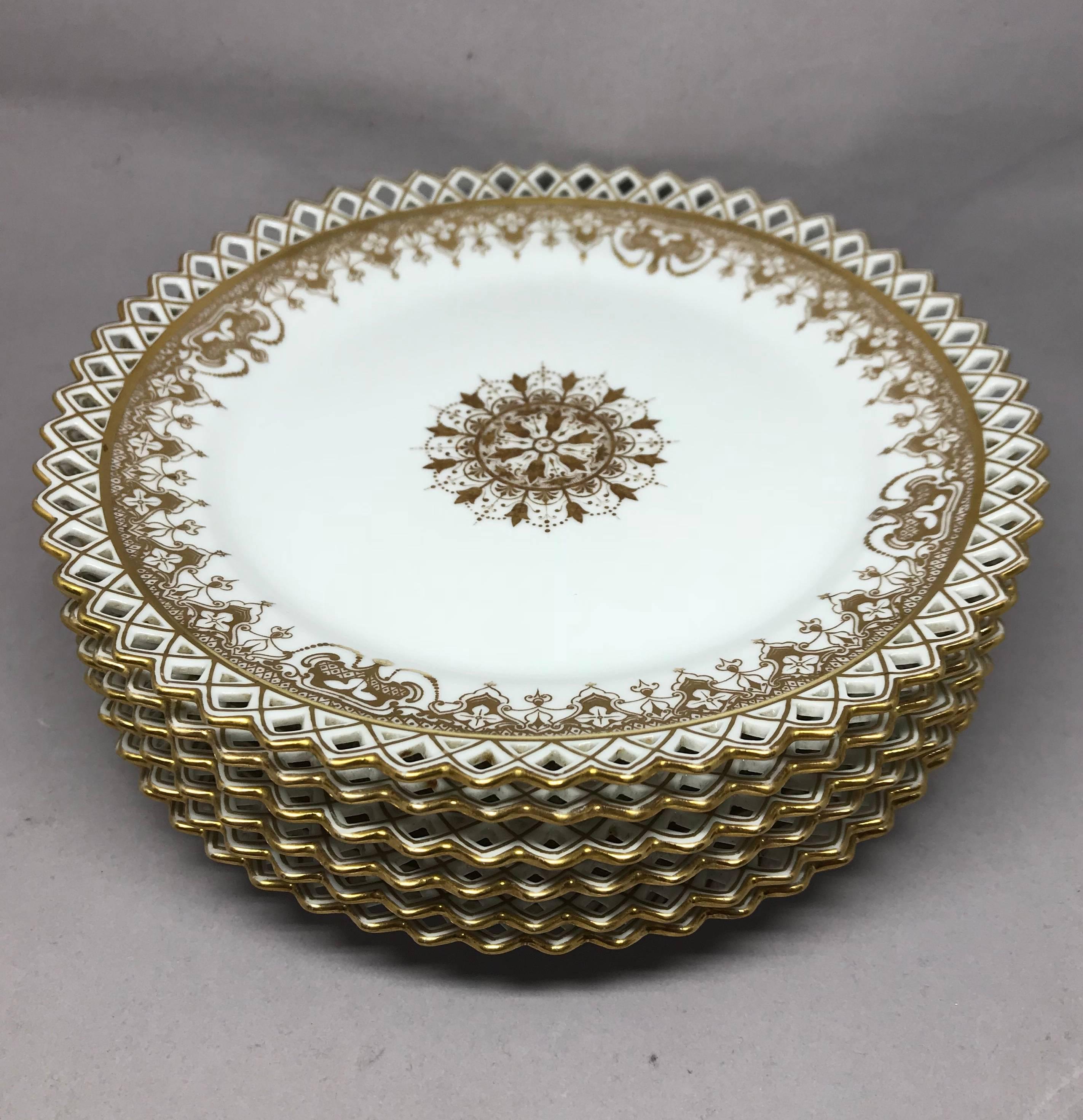 Set of six gilt snowflake plates. Six white and gold decorated plates with central medallion bordered with gold swaging and further arabesque gilt reticulation. Germany, late 19th century
Dimensions: 8.75