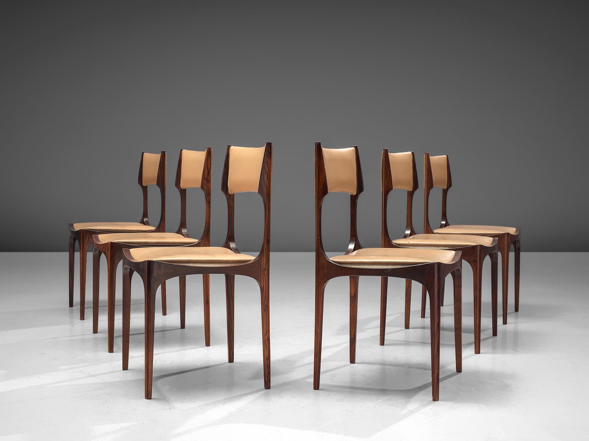 Giuseppe Gibelli for Sormani, set of six dining chairs, maple and leatherette, Italy, 1963.

This elegant set of Italian dining chairs is executed in high-quality maple and beige leatherette. The strength of these chairs lies mainly in the frame.