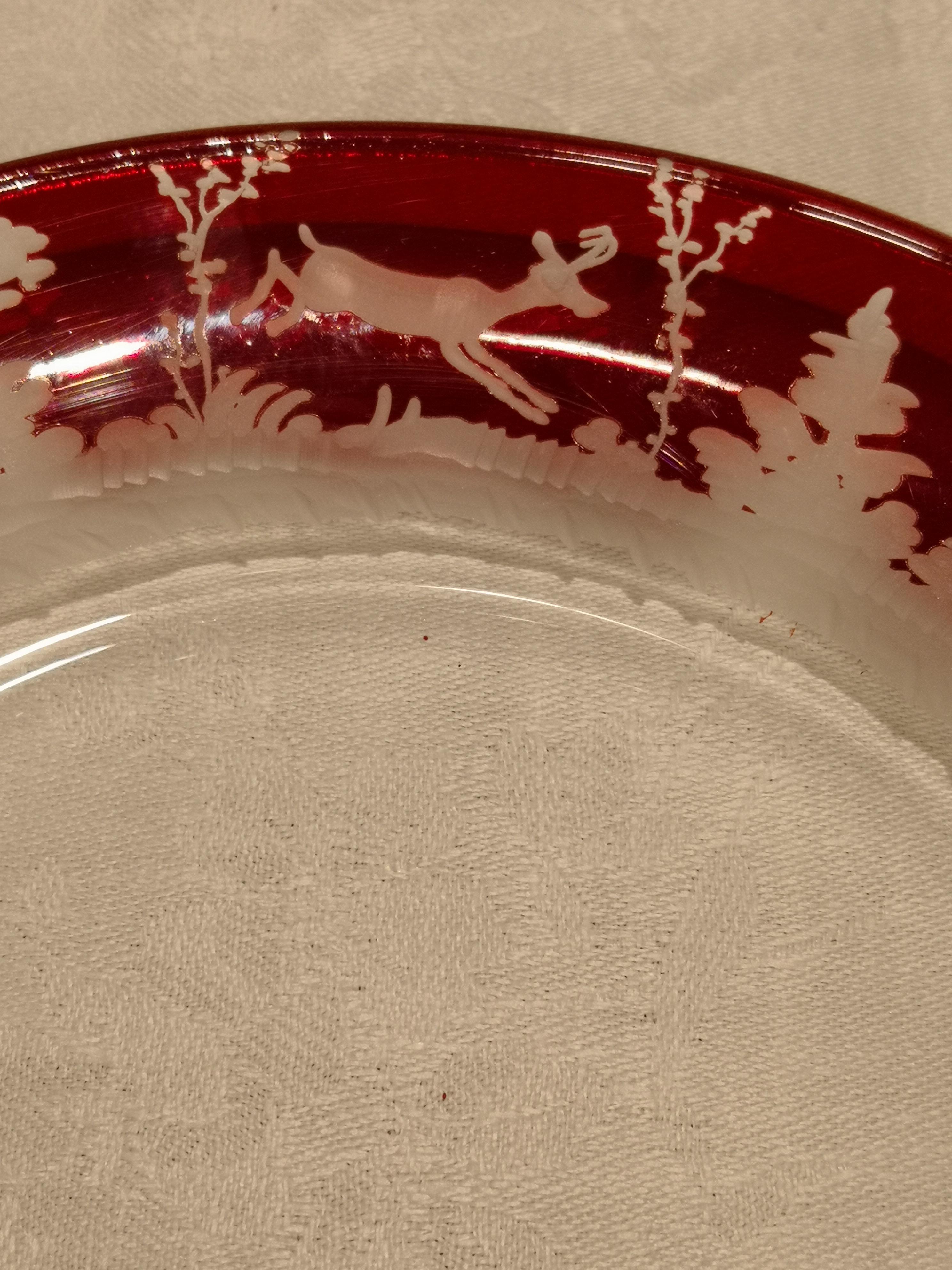 Set of six plates in red crystal with an hands-free engraved antique black forest hunting decor all around. The charming hand-engraved decor shows a hunting decor with deers, rabbit and trees in the style of Black Forest. The glass plates can be