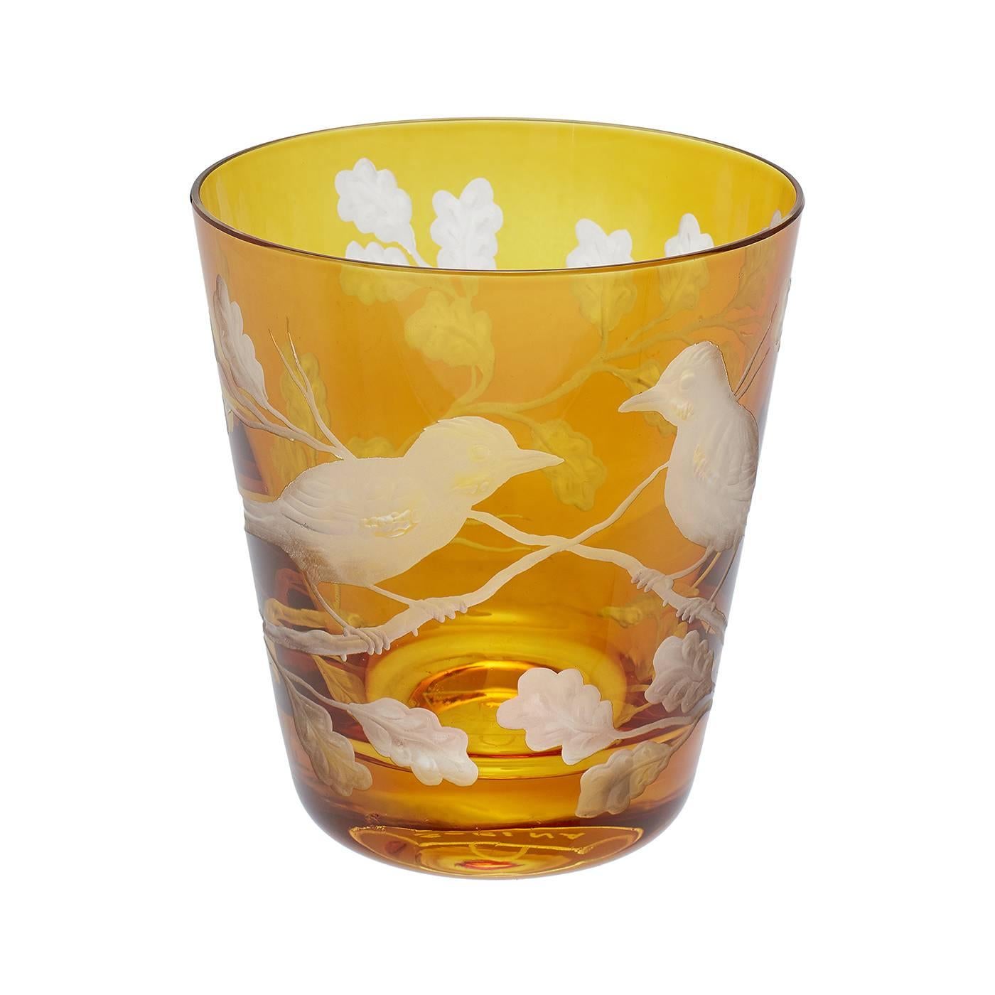 About Sofina crystal:
This handblown crystal tumbler is one of a selection of Sofina crystal completely handcrafted in Bavaria/Germany. The country style design shows two birds sitting on oak leaves. The design is all around free-hands engraved. The