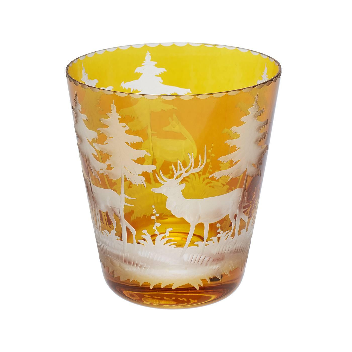 Set of six handblown amber crystal tumblers with hand-edged hunting scene in the style of Black forest. The decor is an antique hunting scene decor with deers, trees and bambis all around. Completely handblown and hand-engraved in Bavaria Germany.