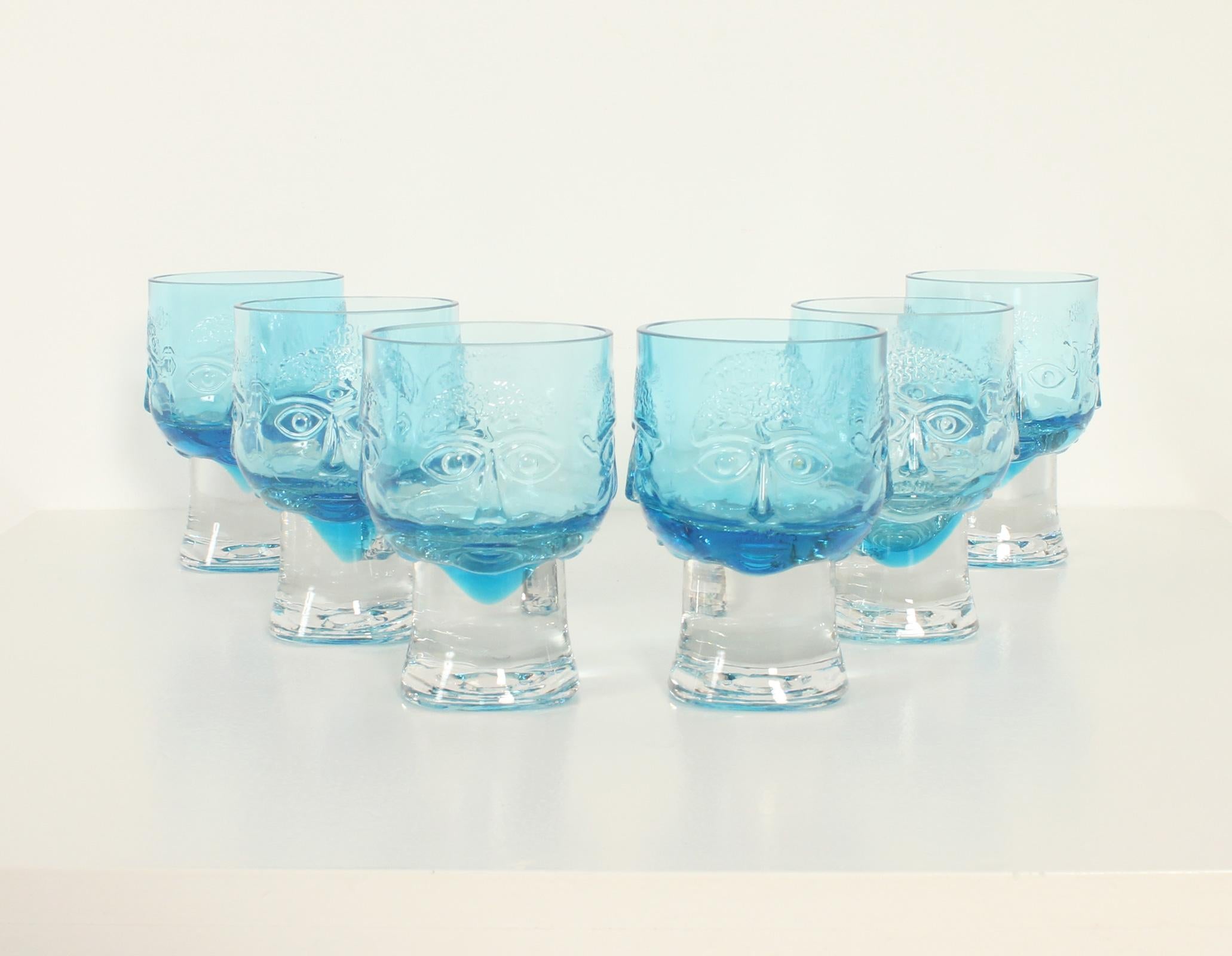 Set of six glasses with four engraved faces by Stylo, Spain, 1960's. Pressed glass in clear and blue glass. 