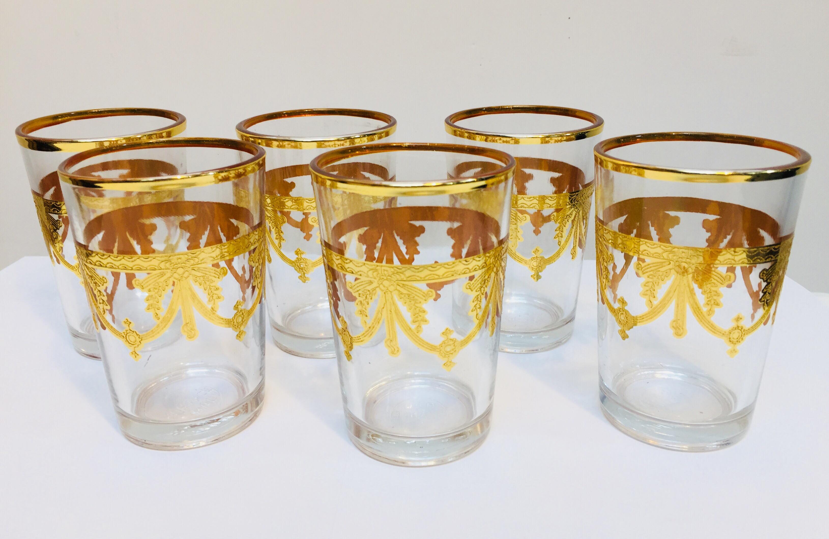 Set of six Moorish glasses with gold raised overlay design
Decorated with a classical gold pattern frieze.
Use these elegant glasses for Moroccan tea, or any hot or cold drink.
In fantastic condition, perfect for the holidays and gorgeous on display