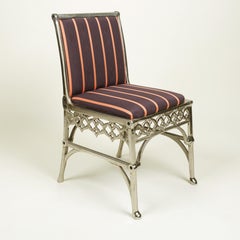 Set of Six Gothic Polished Cast Nickel and Upholstered Chairs