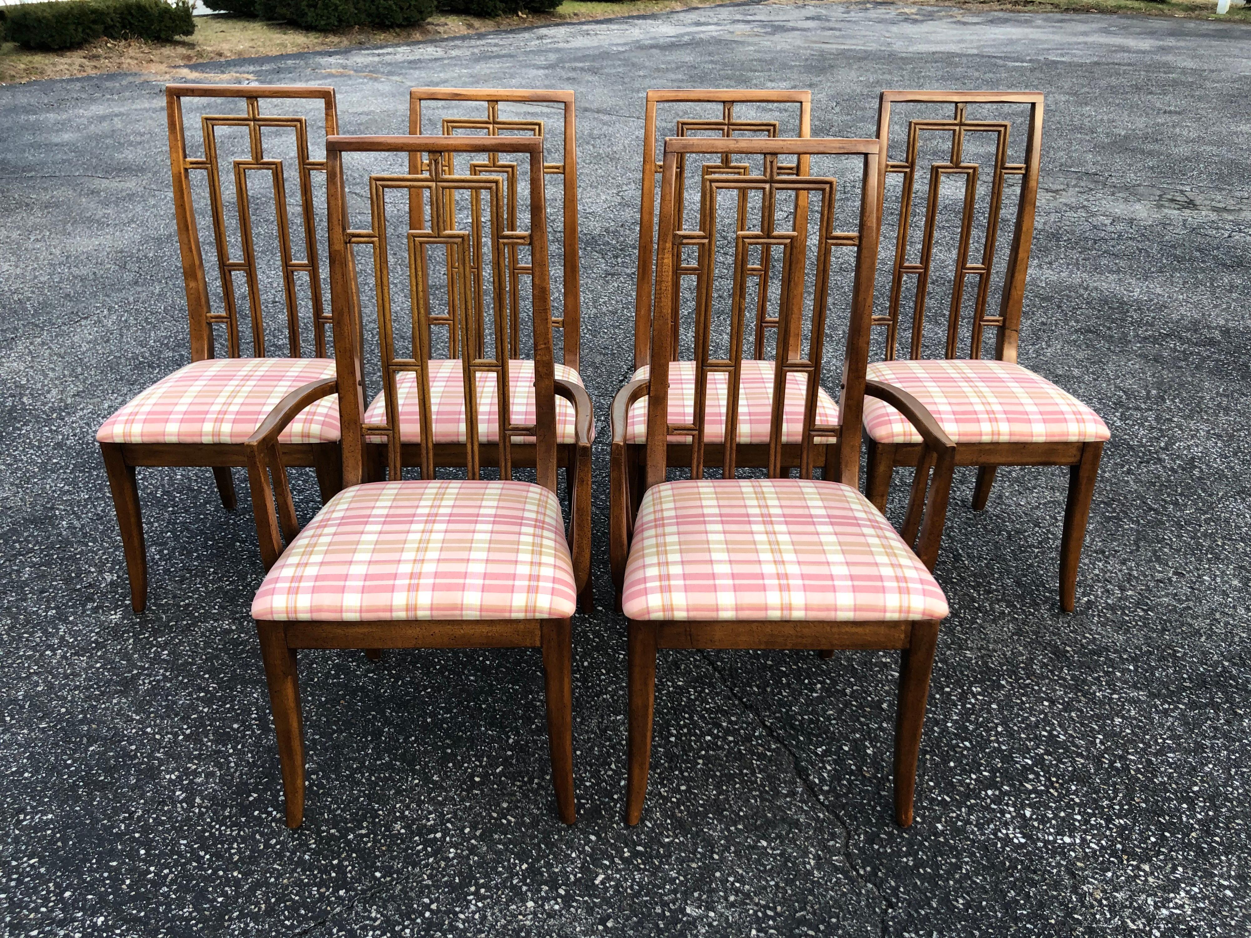 Set of six Greek key mid century wooden dining chairs. Great transitional design to go with any style. Comes with a plaid moire upholstered seat which can unscrew to be recovered if desired. The set consists of two armchairs and four side chairs.