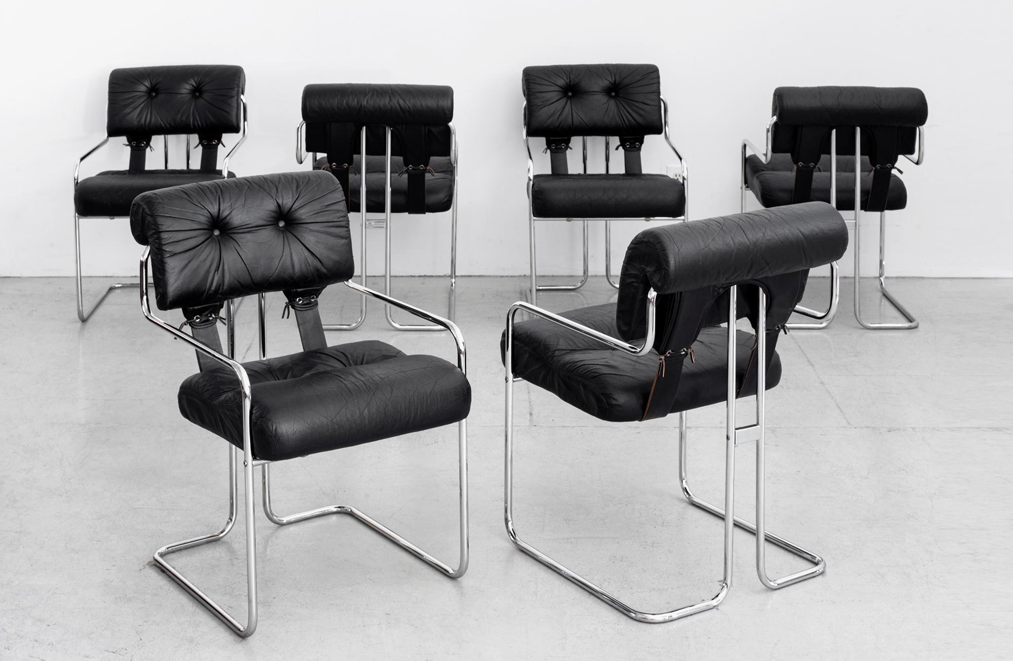 Fantastic set of six Tucroma dining chairs. 
Designed by Guido Faleschini for Mariani, retailed in America by Pace Collection. Original black leather upholstery and chrome metal. 
A handsome set with patina to leather.
 